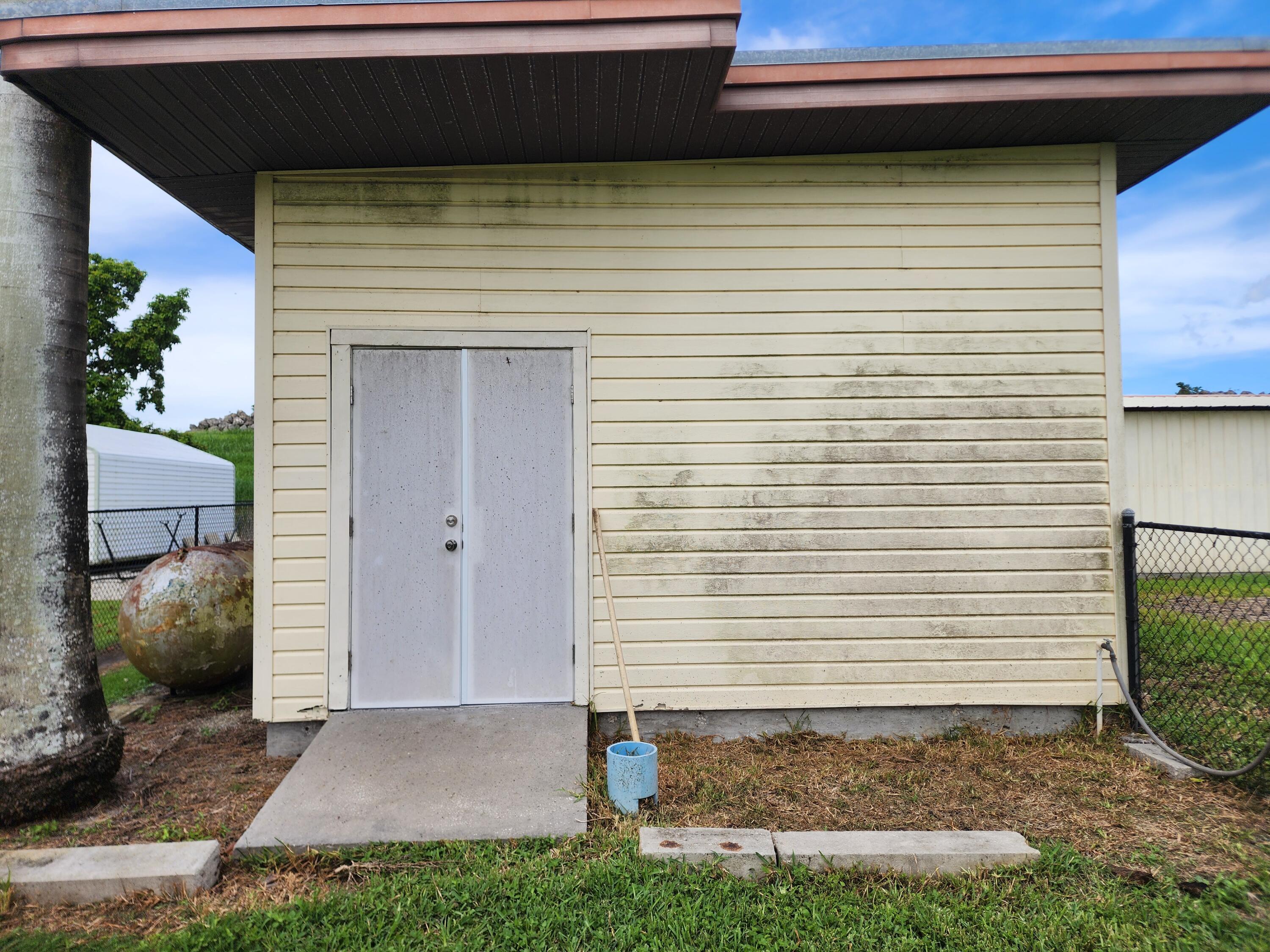 2727 Bacom Point Road Pahokee, FL 33476 - Photo 24 of 34 a view of a backyard