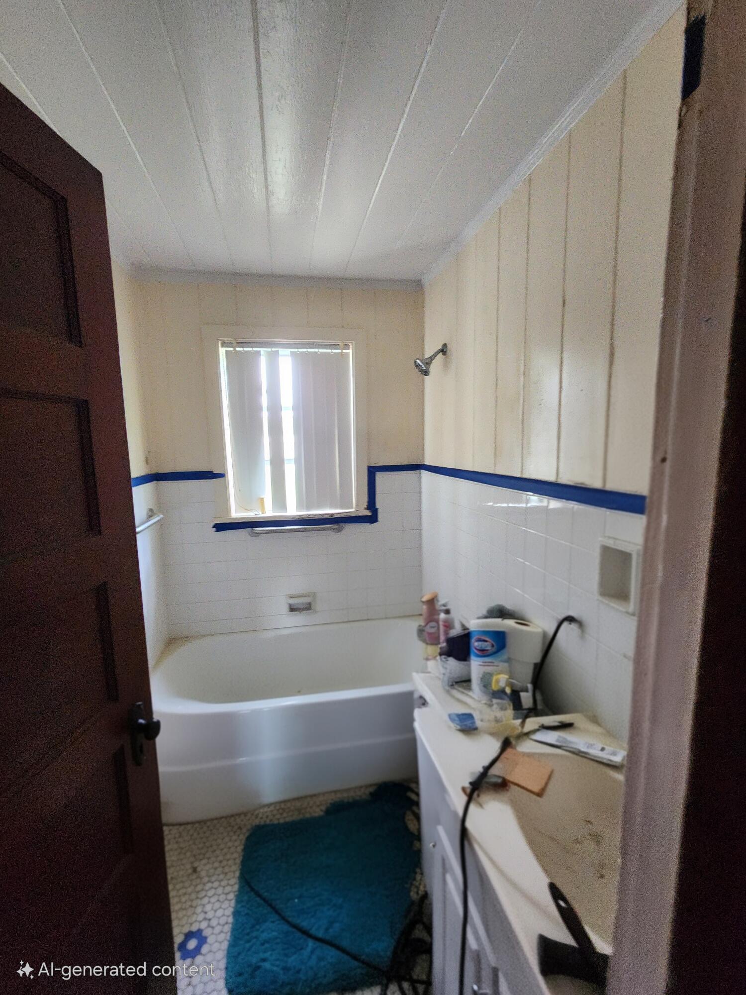 2727 Bacom Point Road Pahokee, FL 33476 - Photo 25 of 34 a bathroom with a sink and a bathtub