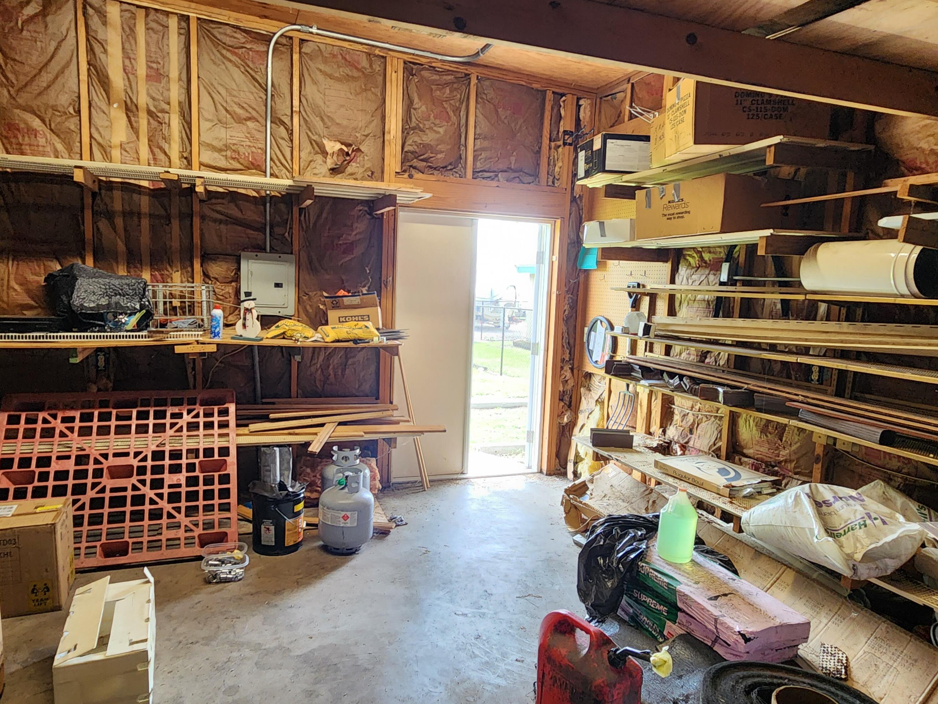 2727 Bacom Point Road Pahokee, FL 33476 - Photo 32 of 34 a view of outdoor space with seating area