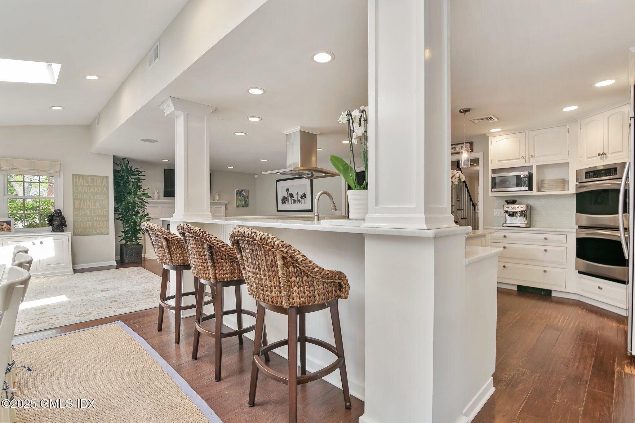 16 Split Timber Place Riverside, CT 06878 - Photo 15 of 34 a dining room with furniture and wooden floor