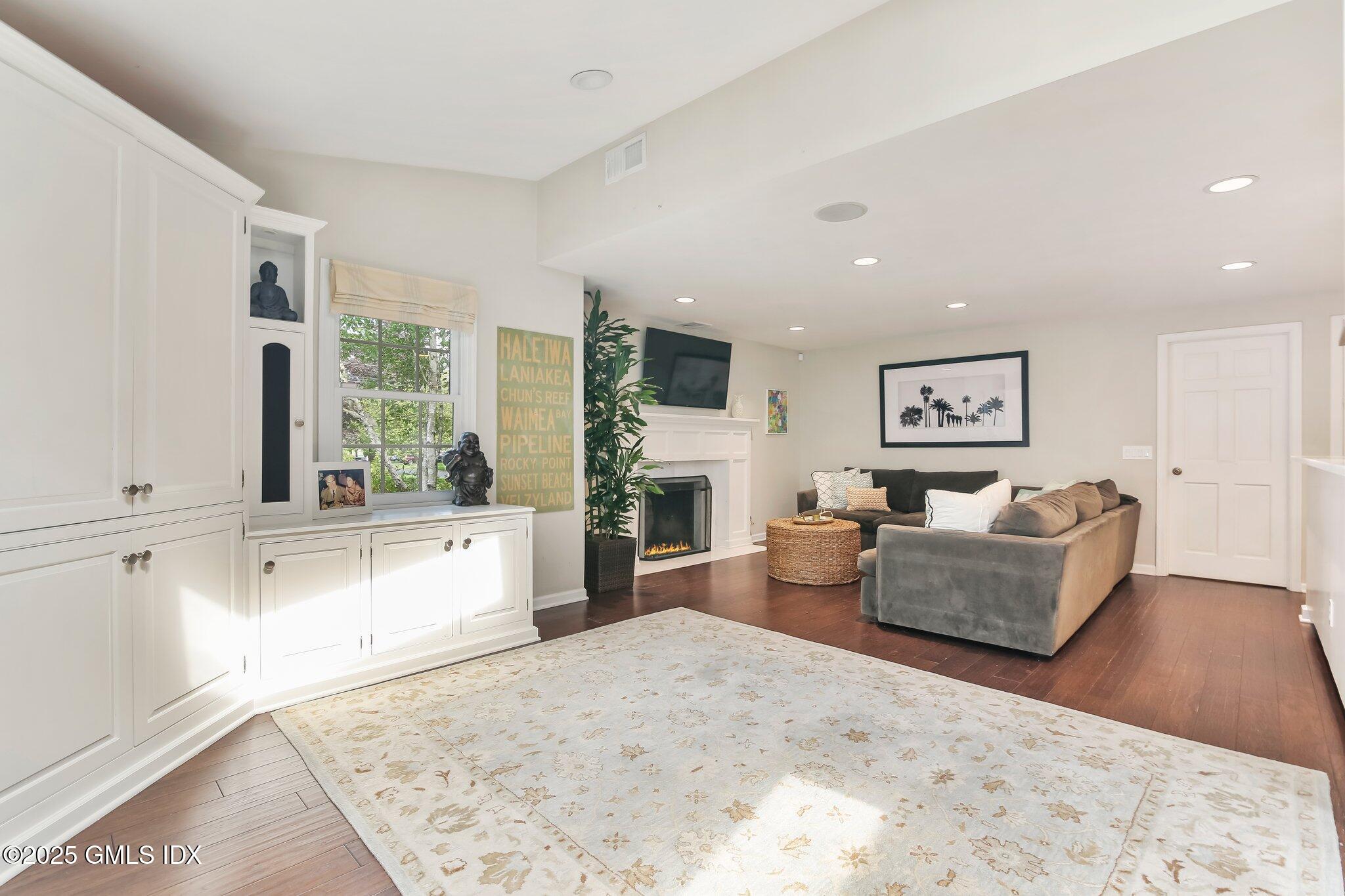 16 Split Timber Place Riverside, CT 06878 - Photo 18 of 34 a living room with furniture and a fireplace