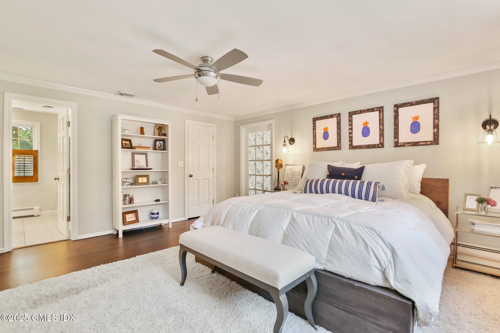 16 Split Timber Place Riverside, CT 06878 - Photo 20 of 34 a spacious bedroom with a bed and a cabinets