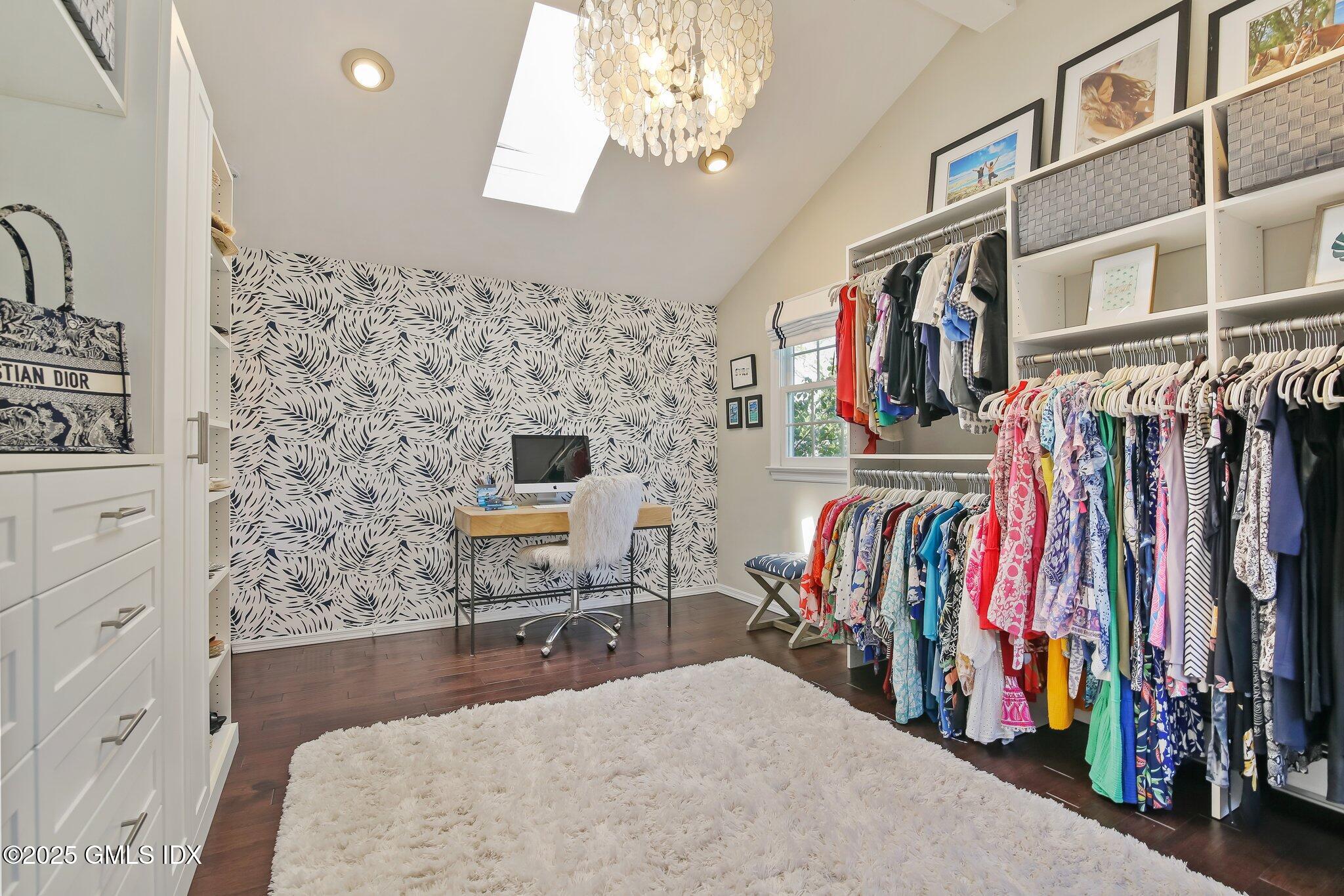 16 Split Timber Place Riverside, CT 06878 - Photo 22 of 34 a view of walk in closet with clothes and shoes