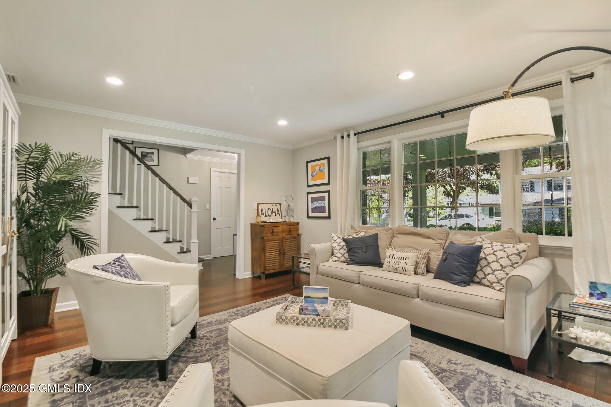 16 Split Timber Place Riverside, CT 06878 - Photo 4 of 34 a living room with furniture and a potted plant