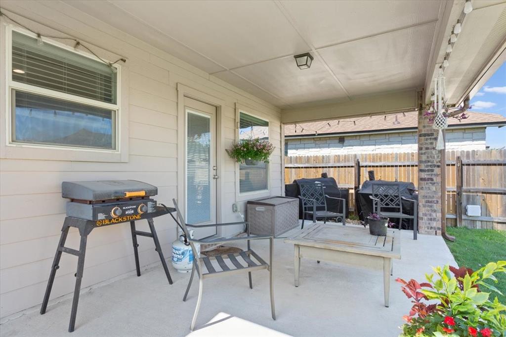 5308 Tama Drive Waco, TX 76708 - Photo 25 of 29 a dining room with furniture and a potted plant