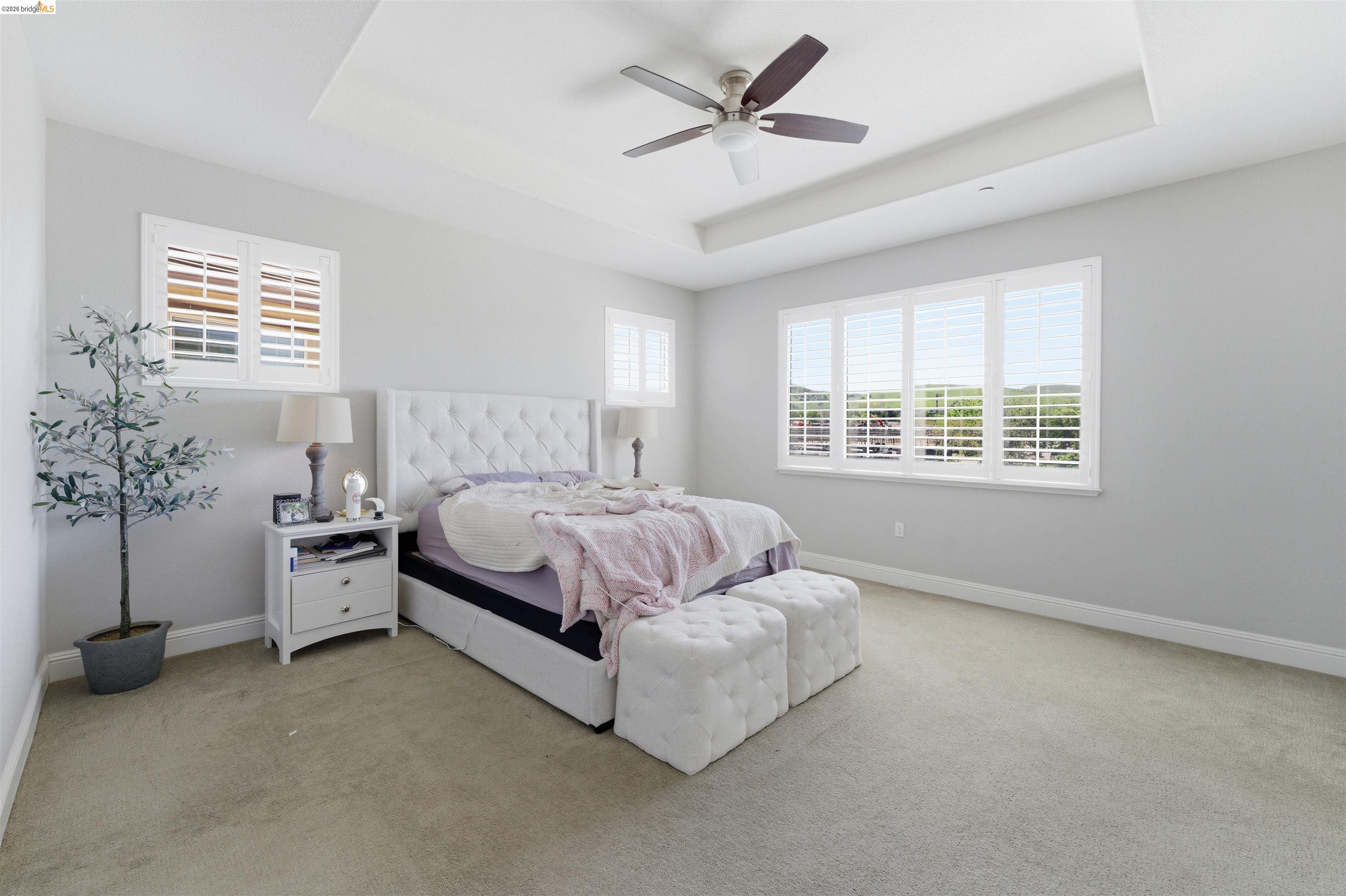 72 Greystone Place Pittsburg, CA 94565 - Photo 23 of 41 a spacious bedroom with a bed and a window