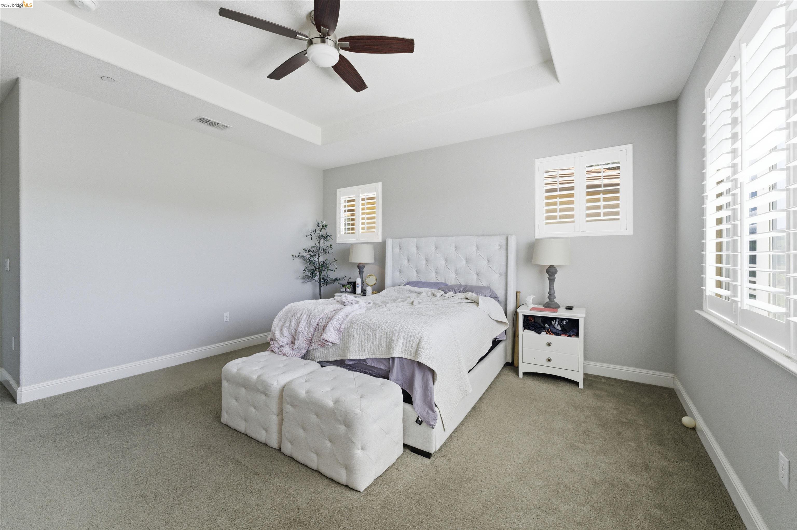 72 Greystone Place Pittsburg, CA 94565 - Photo 24 of 41 a bedroom with a bed and window