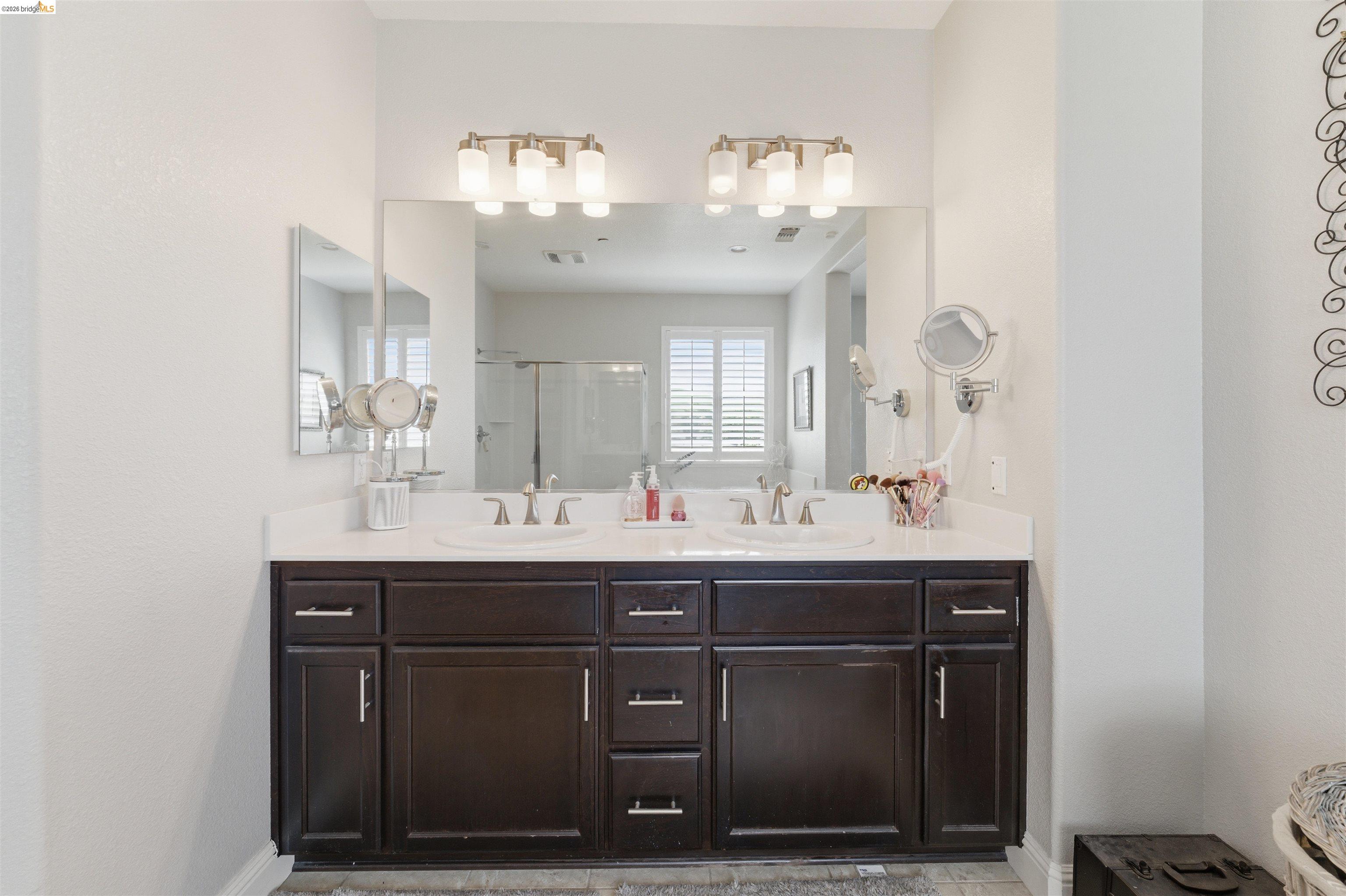 72 Greystone Place Pittsburg, CA 94565 - Photo 28 of 41 a bathroom with a sink and a mirror