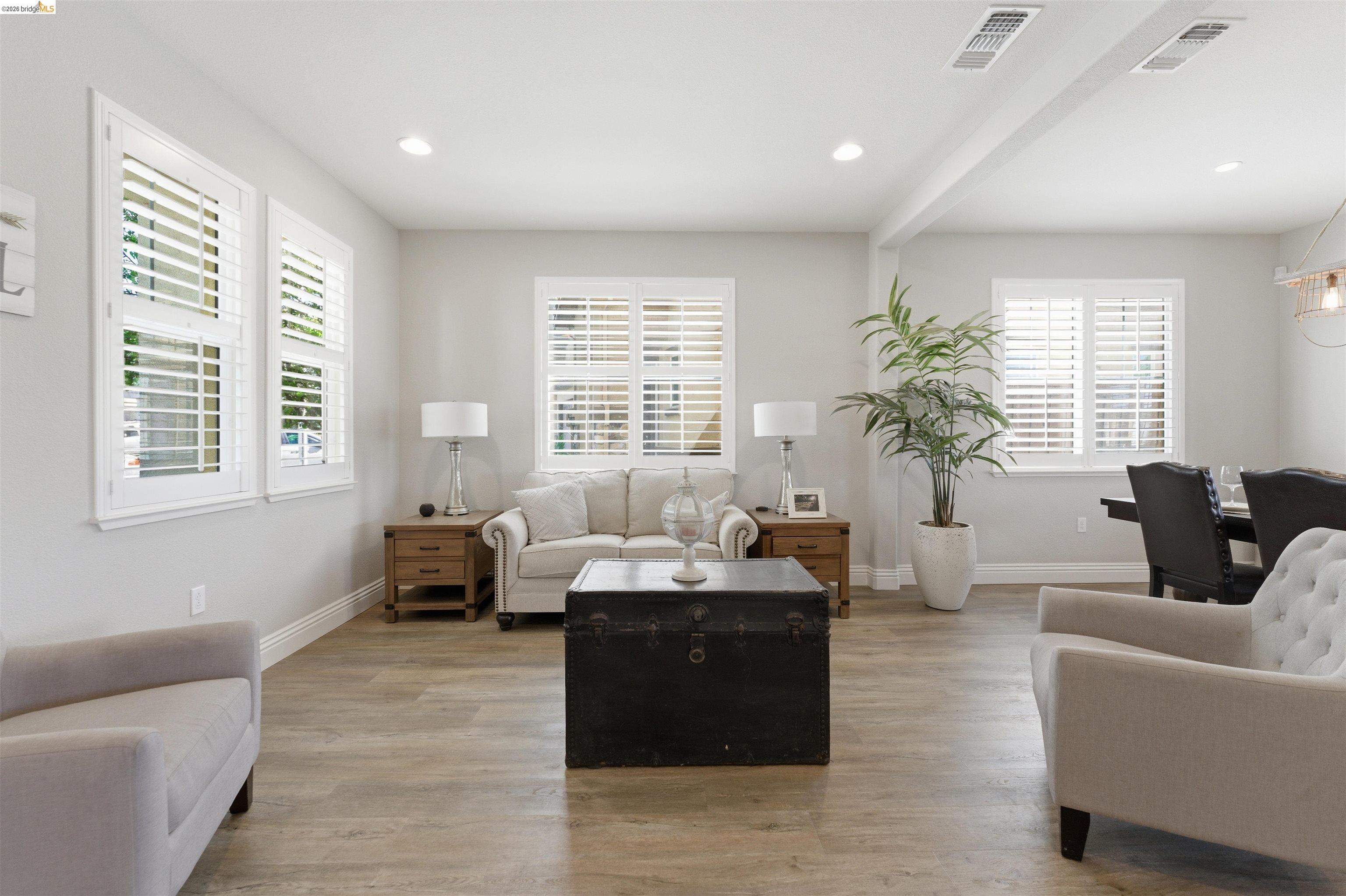 72 Greystone Place Pittsburg, CA 94565 - Photo 6 of 41 a living room with furniture and windows