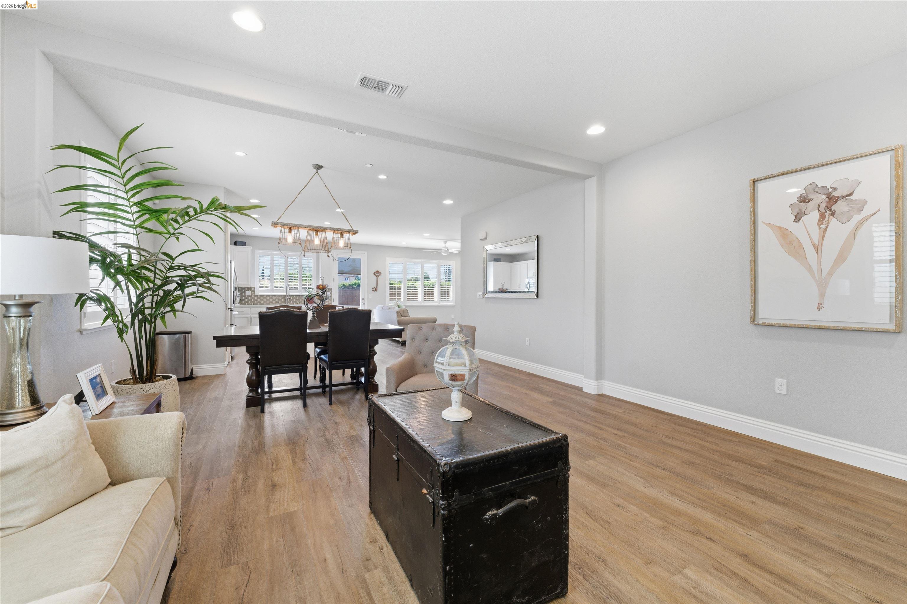 72 Greystone Place Pittsburg, CA 94565 - Photo 8 of 41 a living room with furniture kitchen view and a dining table