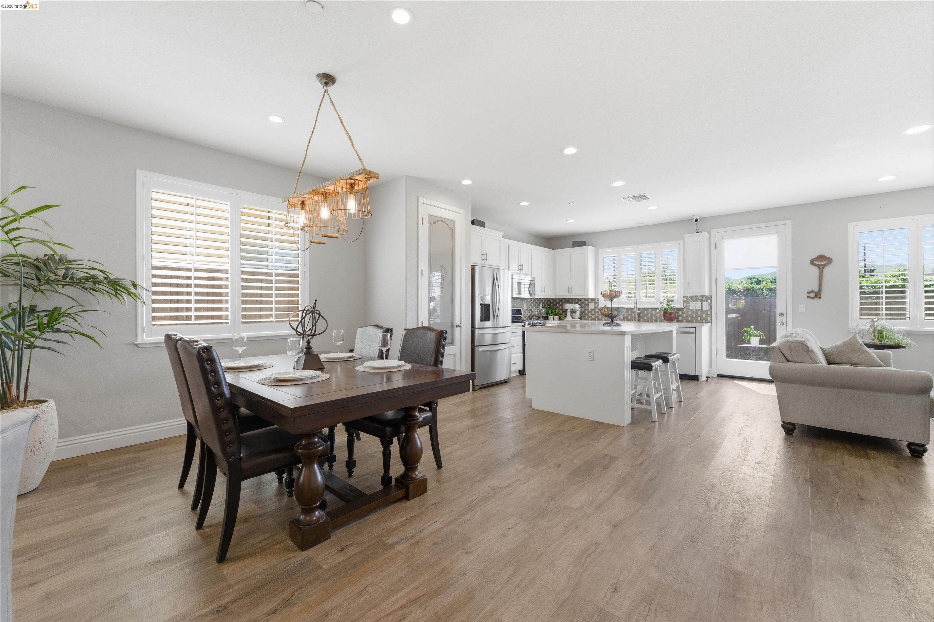 72 Greystone Place Pittsburg, CA 94565 - Photo 10 of 41 a kitchen with a table and chairs