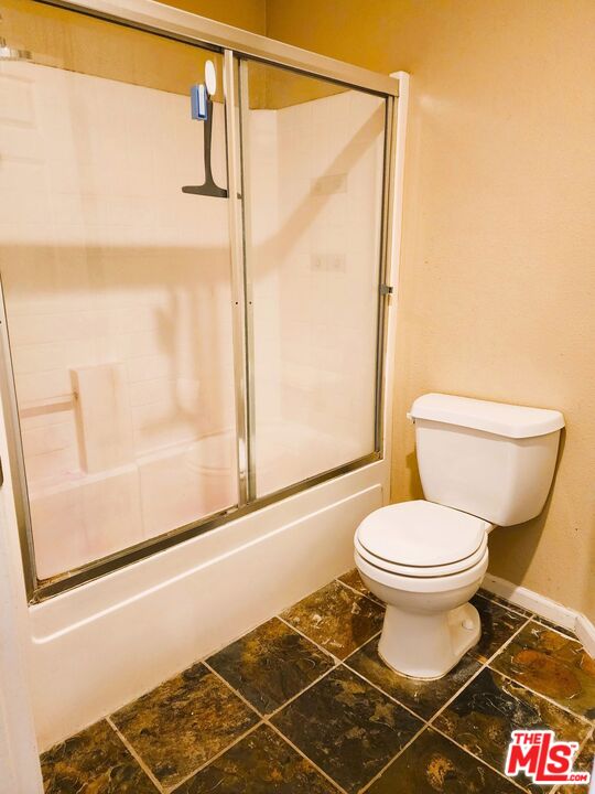 375 Central Avenue, Unit 165 Riverside, CA 92507 - Photo 12 of 24 a bathroom with a toilet and a shower