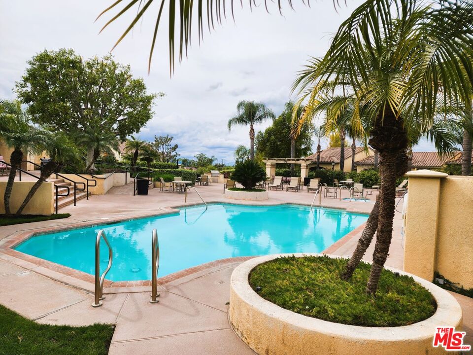 375 Central Avenue, Unit 165 Riverside, CA 92507 - Photo 20 of 24 a swimming pool with a outdoor seating