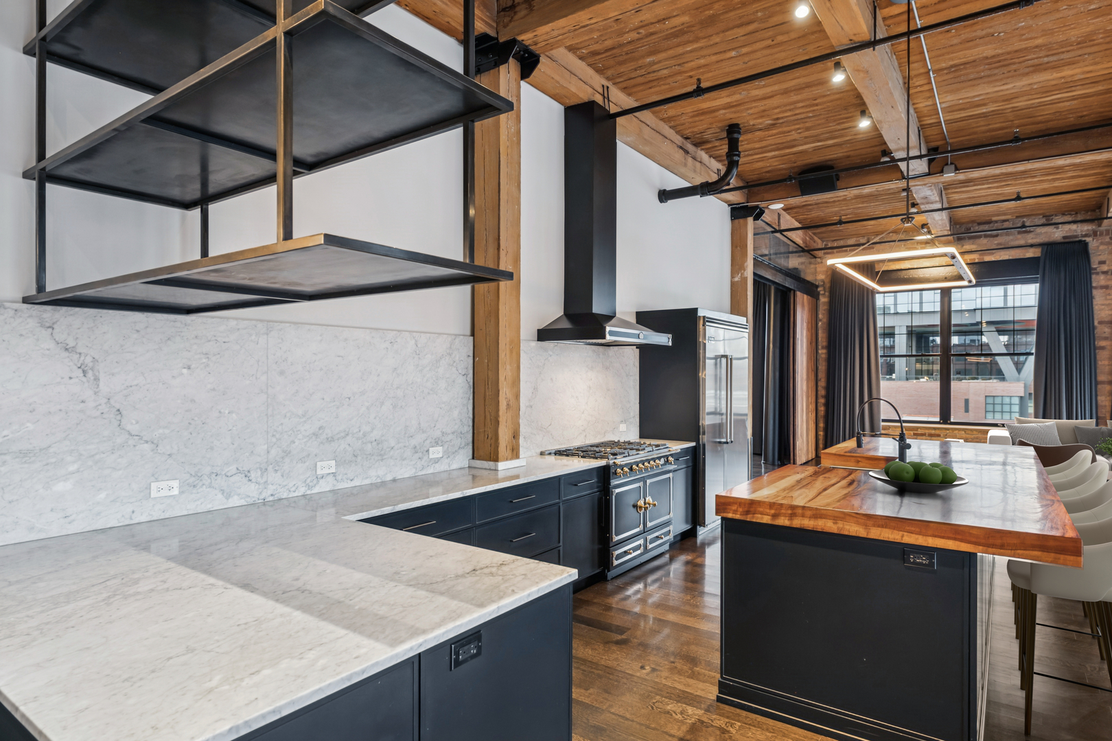 1000 West Washington Boulevard, Unit 436437 Chicago, IL 60607 - Photo 11 of 42 a kitchen with stainless steel appliances granite countertop a sink and a stove