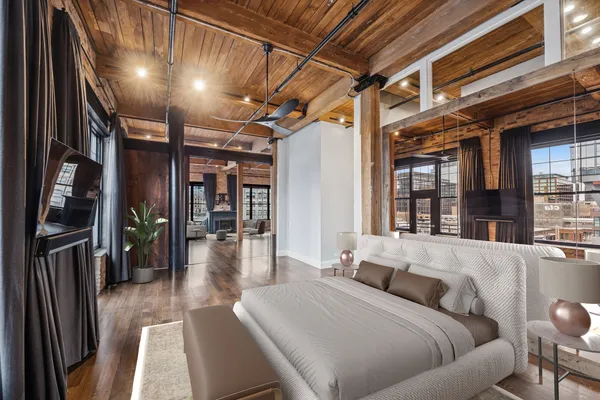 a lobby with furniture and a window