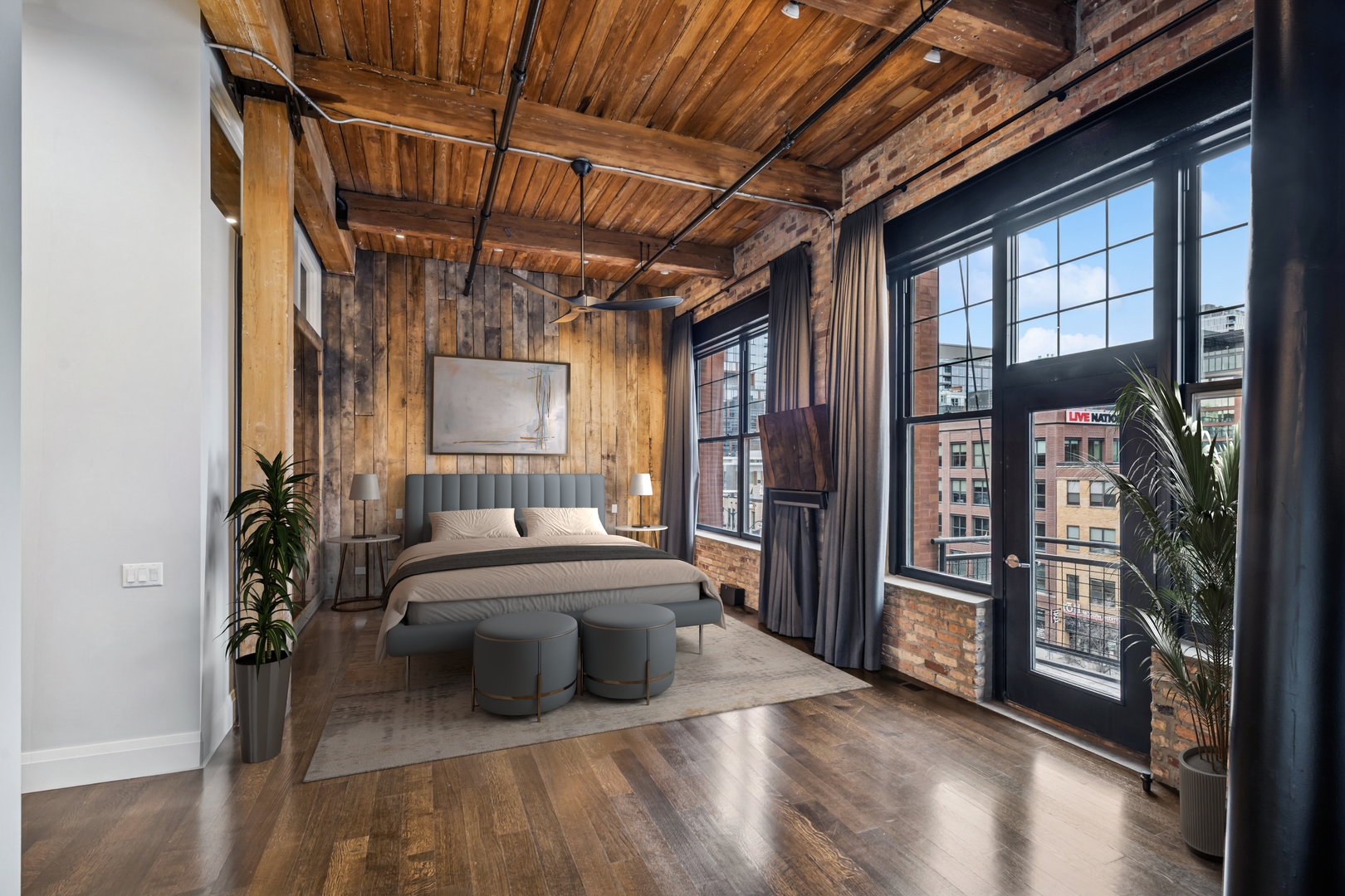 1000 West Washington Boulevard, Unit 436437 Chicago, IL 60607 - Photo 19 of 42 a living room with furniture a flat screen tv and a floor to ceiling window