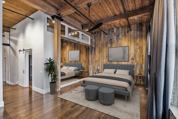 a room with furniture and a potted plant