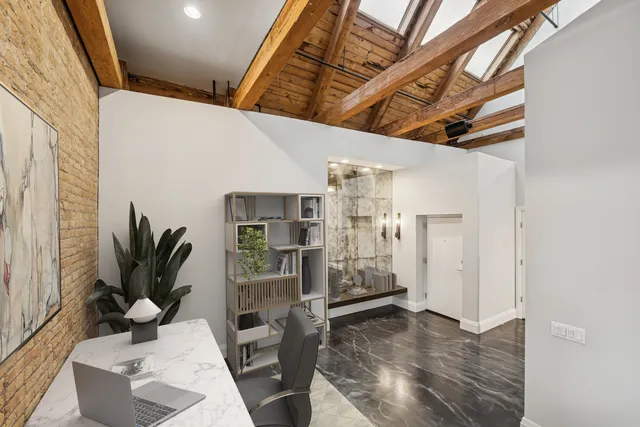 a view of entryway with livingroom