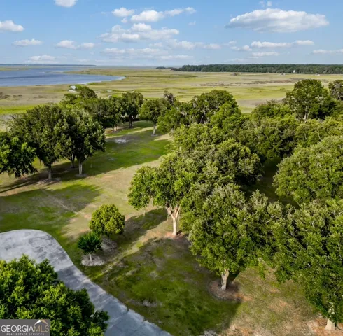 a view of an ocean and a yard