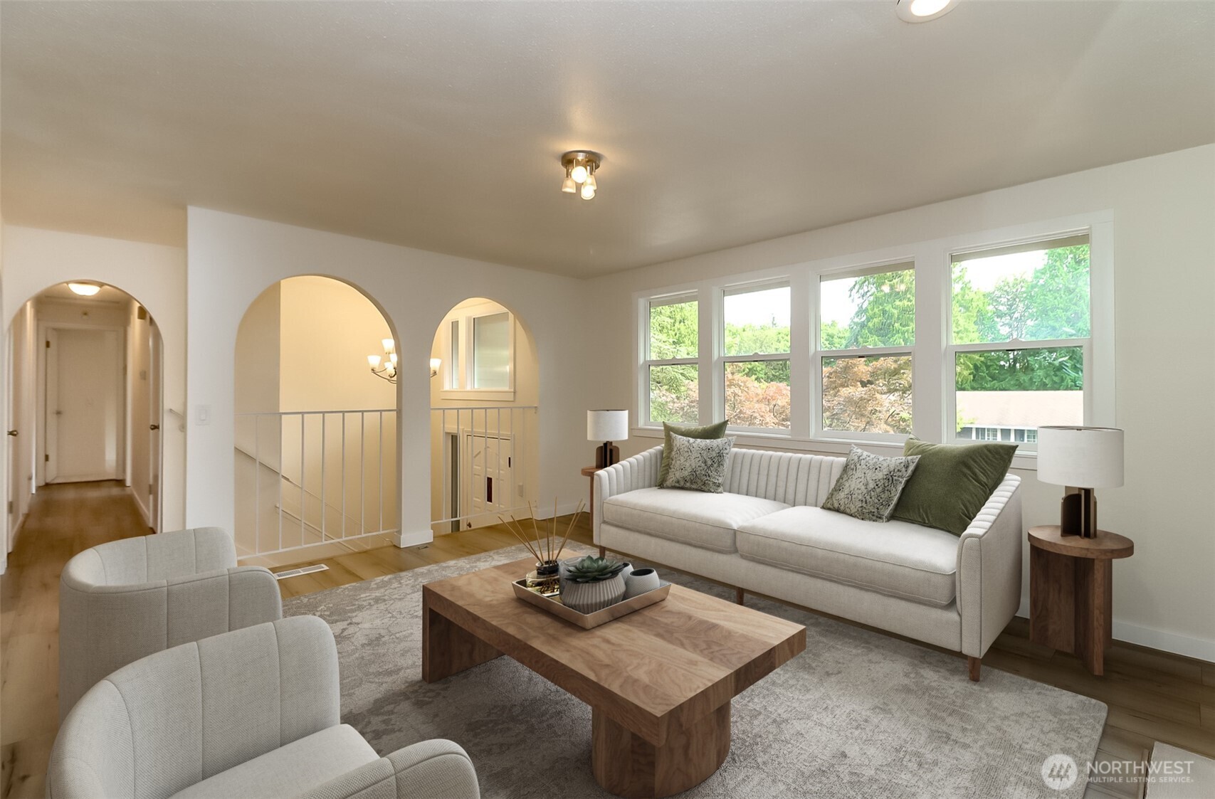 20015 108th Avenue Northeast Bothell, WA 98011 - Photo 2 of 30 a living room with furniture and a large window