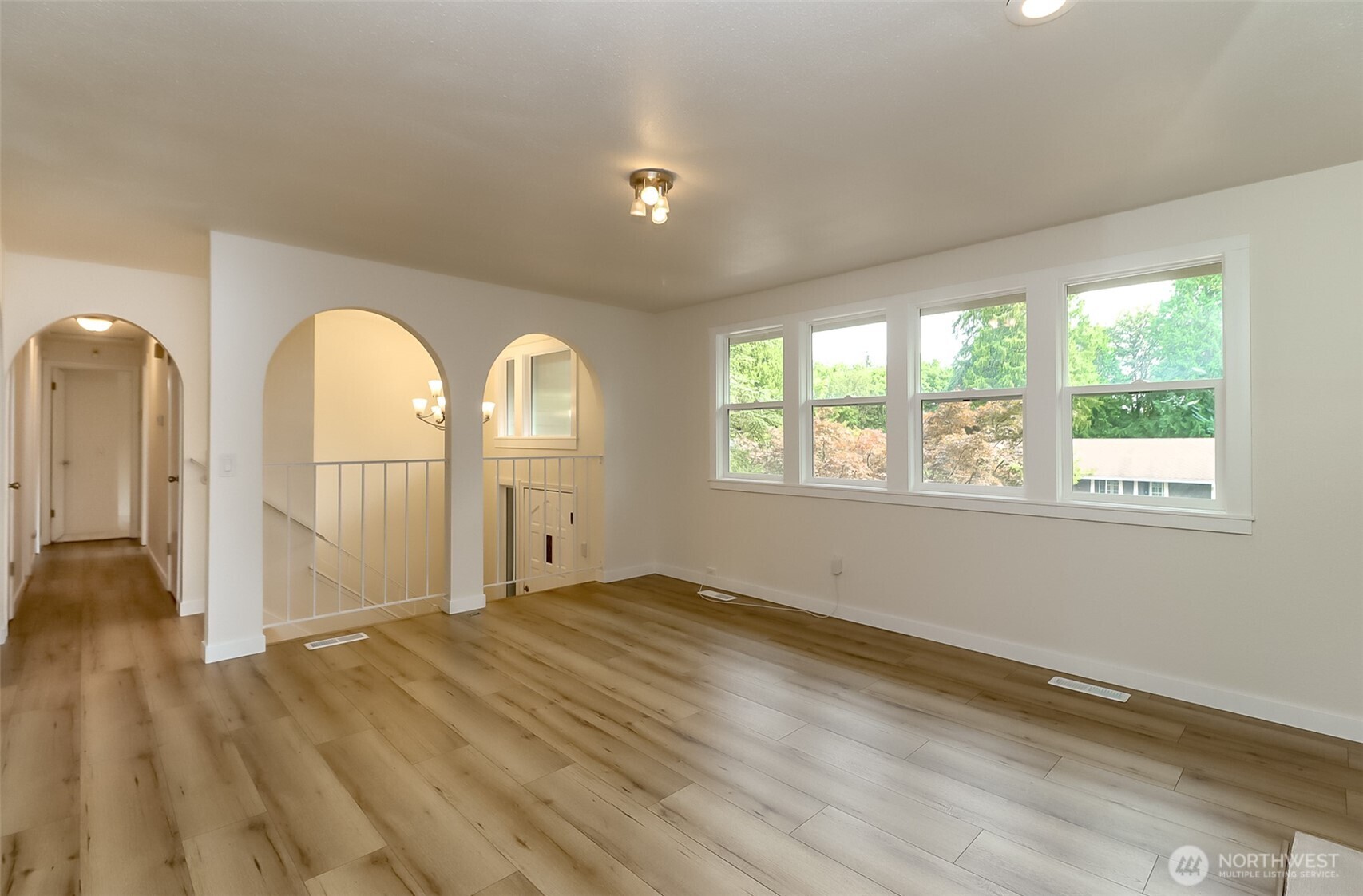 20015 108th Avenue Northeast Bothell, WA 98011 - Photo 25 of 30 a view of empty room with wooden floor