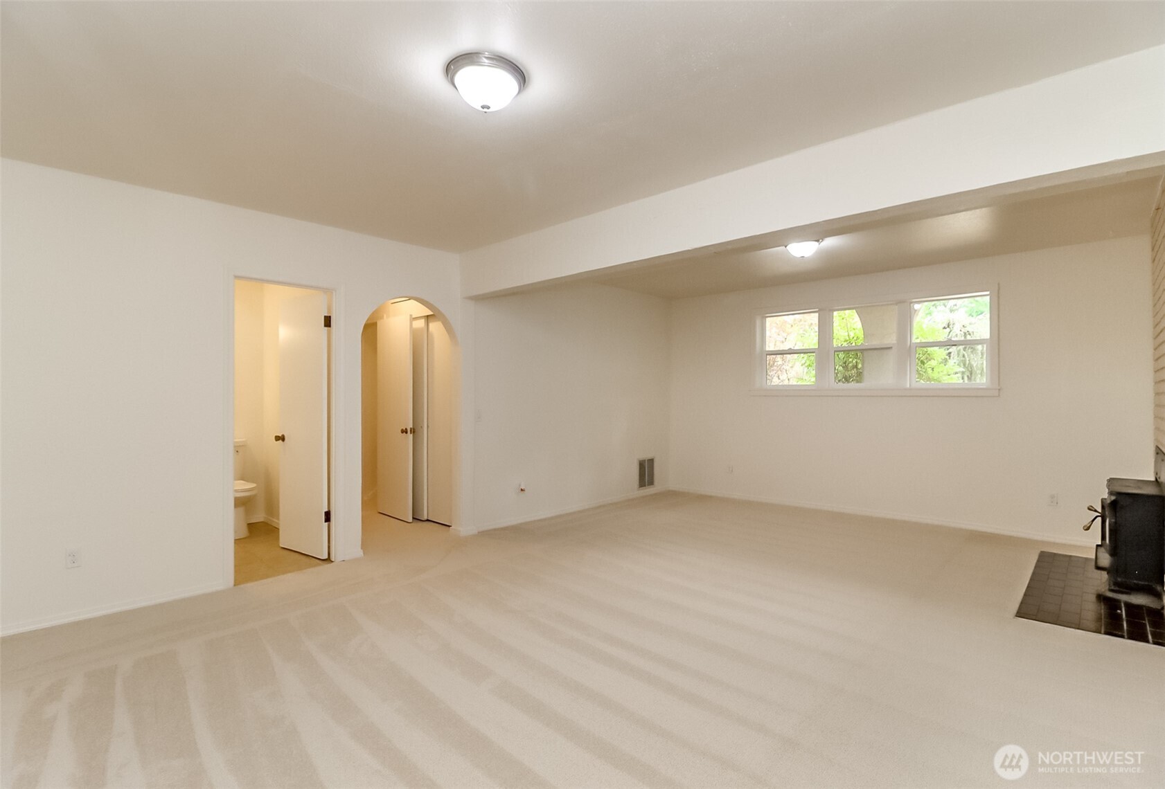 20015 108th Avenue Northeast Bothell, WA 98011 - Photo 28 of 30 a view of an empty room with a window