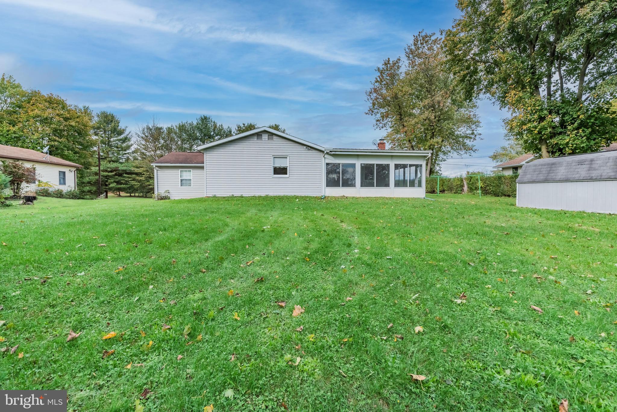 416 Steelstown Road Newville, PA 17241 - Photo 42 of 44 Side view of home showing screen porch & kitchen
