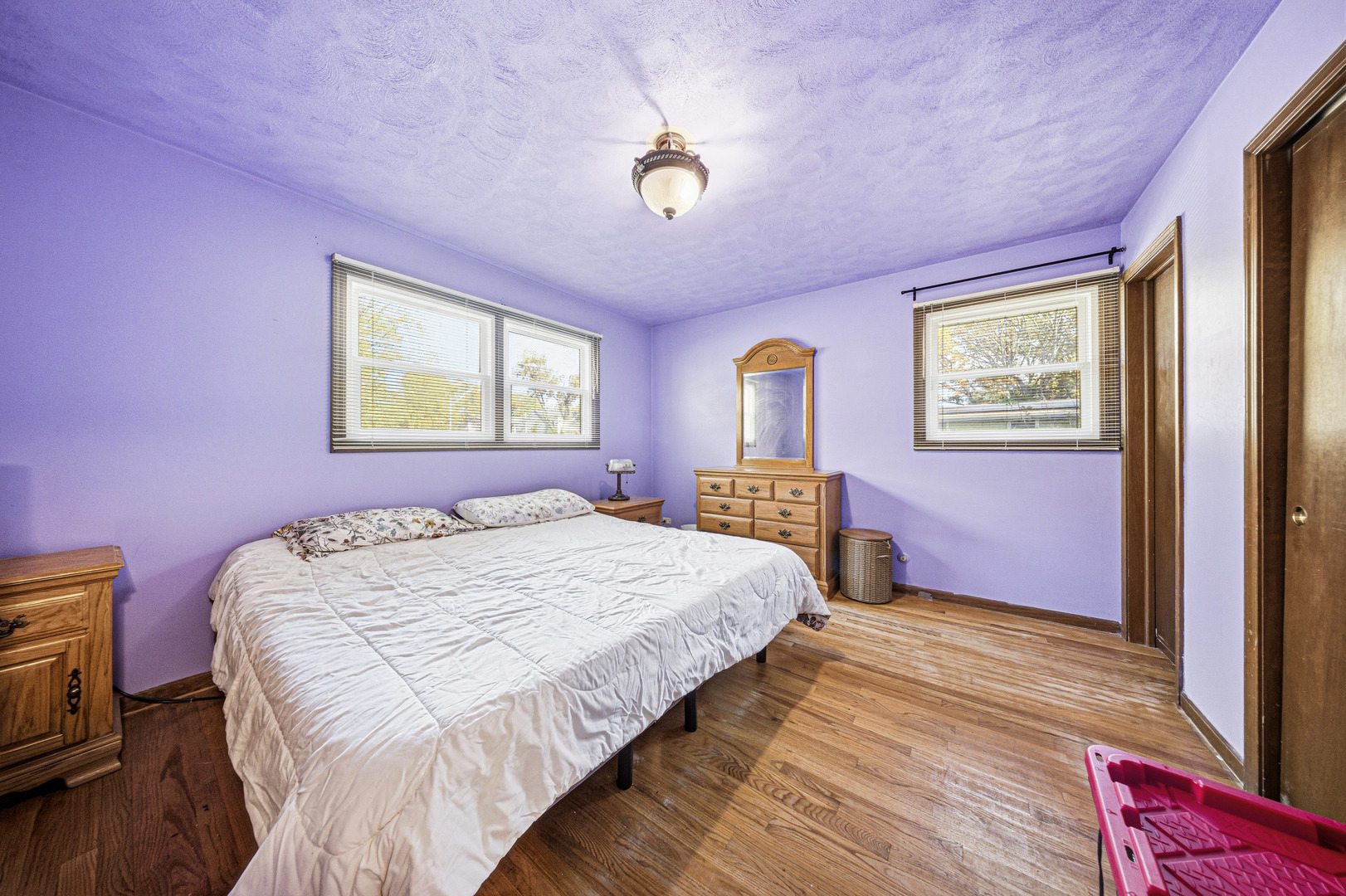 491 Maple Avenue Carpentersville, IL 60110 - Photo 15 of 33 a bedroom with a bed and a window
