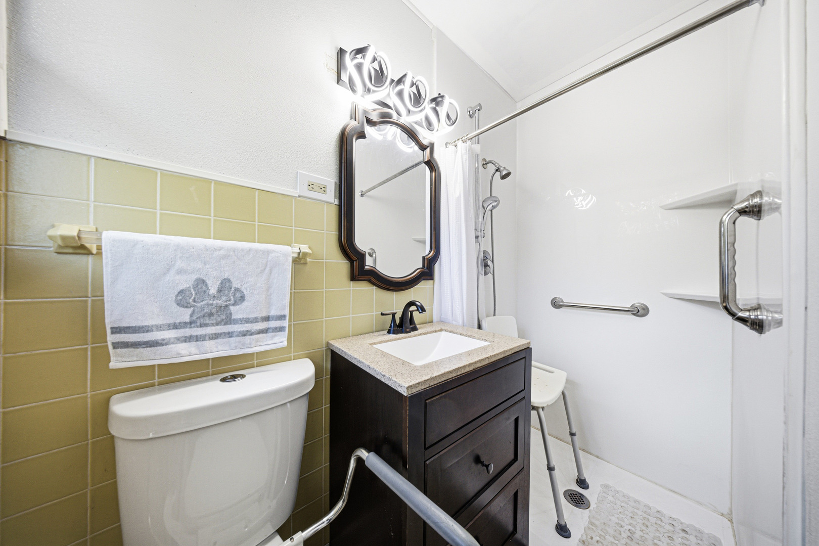 491 Maple Avenue Carpentersville, IL 60110 - Photo 16 of 33 a bathroom with a sink a toilet and a mirror