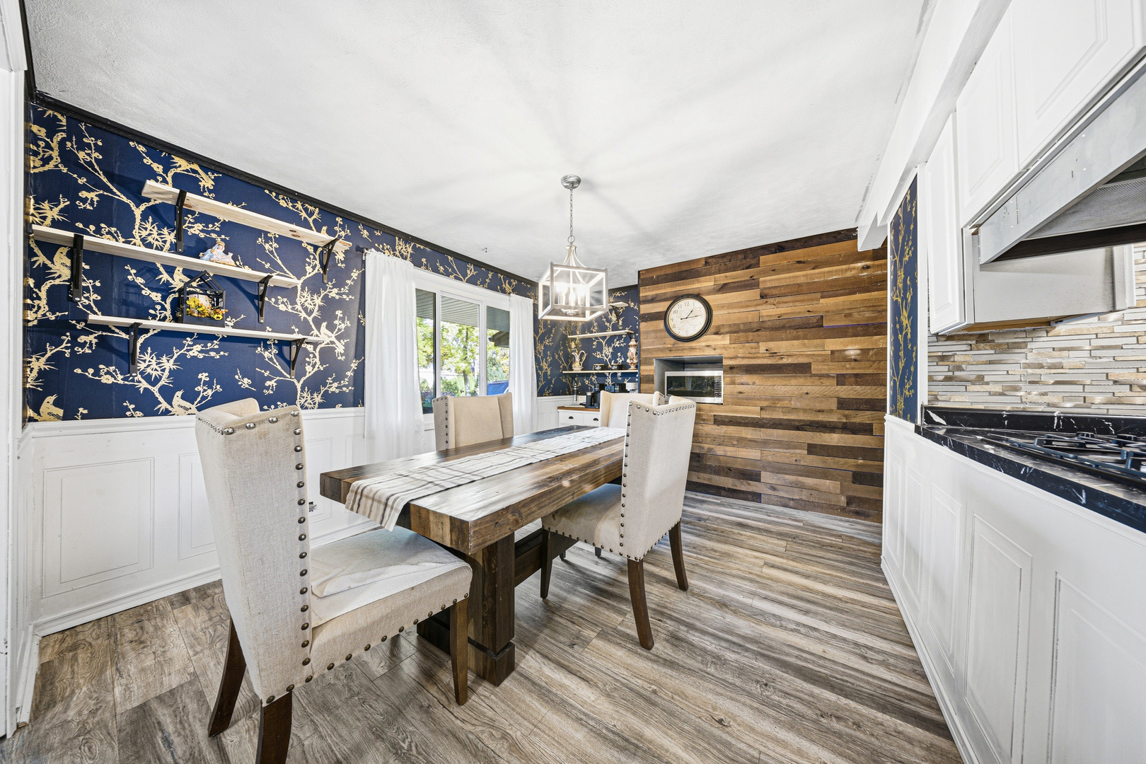 491 Maple Avenue Carpentersville, IL 60110 - Photo 5 of 33 a view of a dining room with furniture and wooden floor