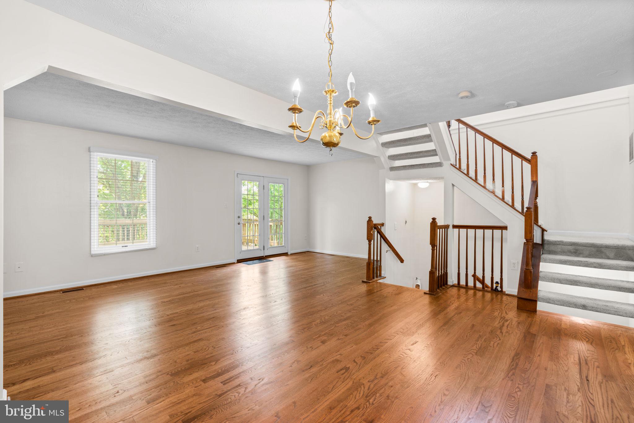 5646 April Journey, Unit 50 Columbia, MD 21044 - Photo 11 of 32 a view of an entryway with wooden floor