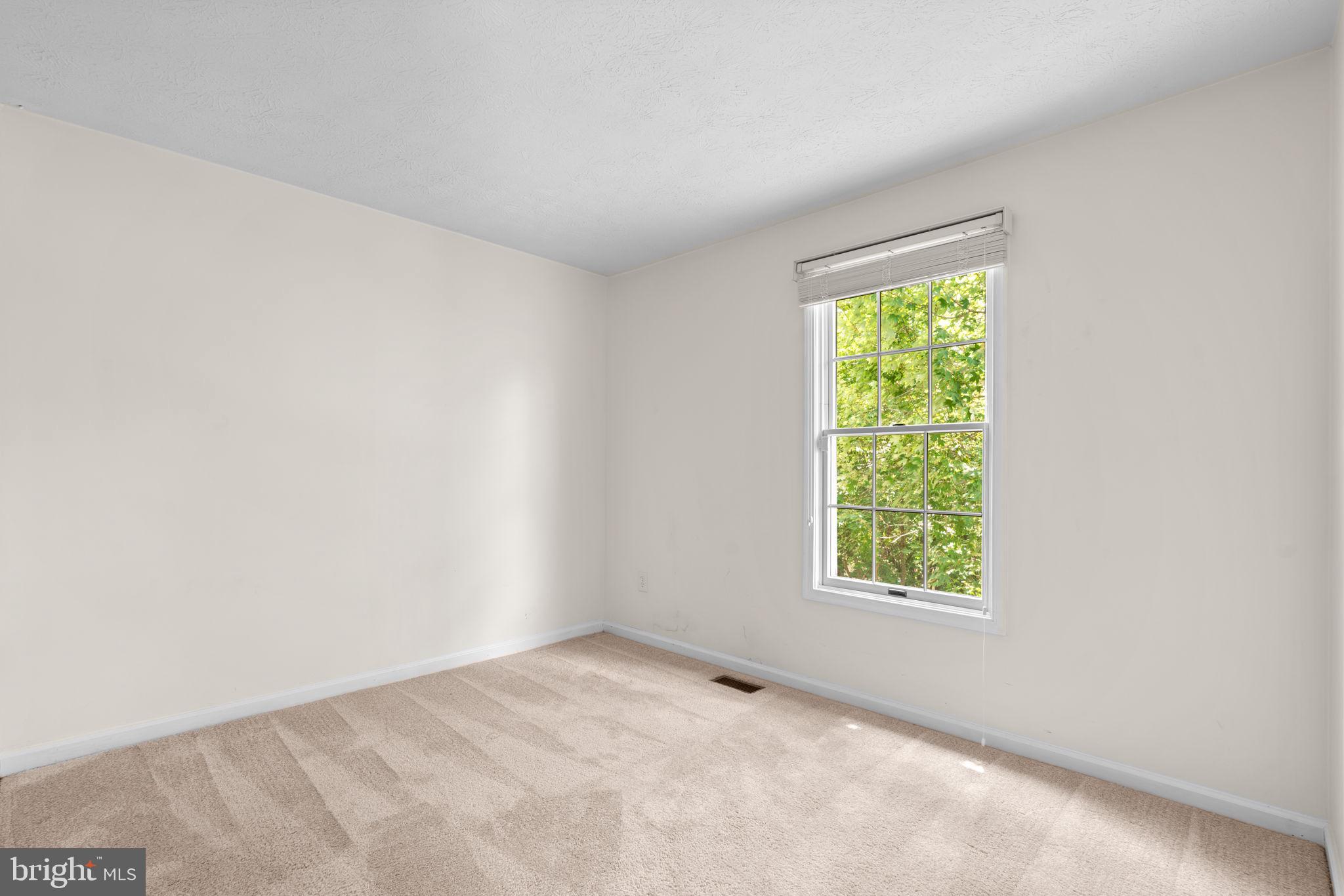 5646 April Journey, Unit 50 Columbia, MD 21044 - Photo 22 of 32 an empty room with a window