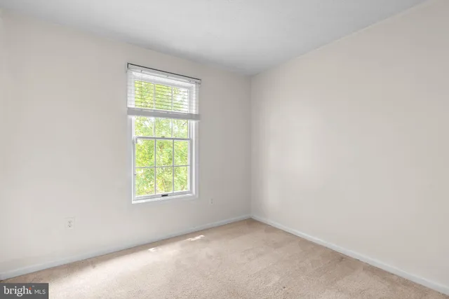 an empty room with window