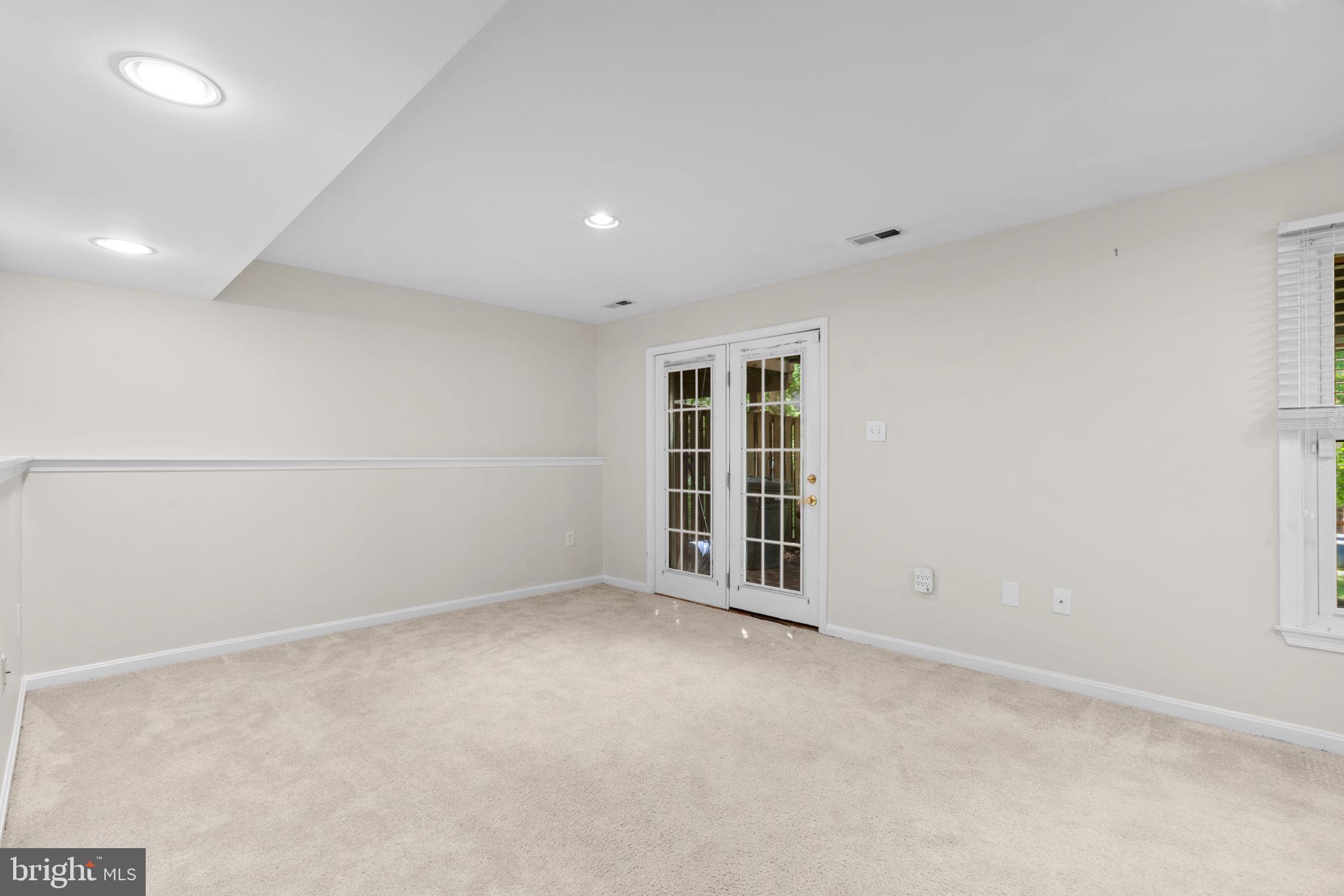 5646 April Journey, Unit 50 Columbia, MD 21044 - Photo 29 of 32 an empty room with windows