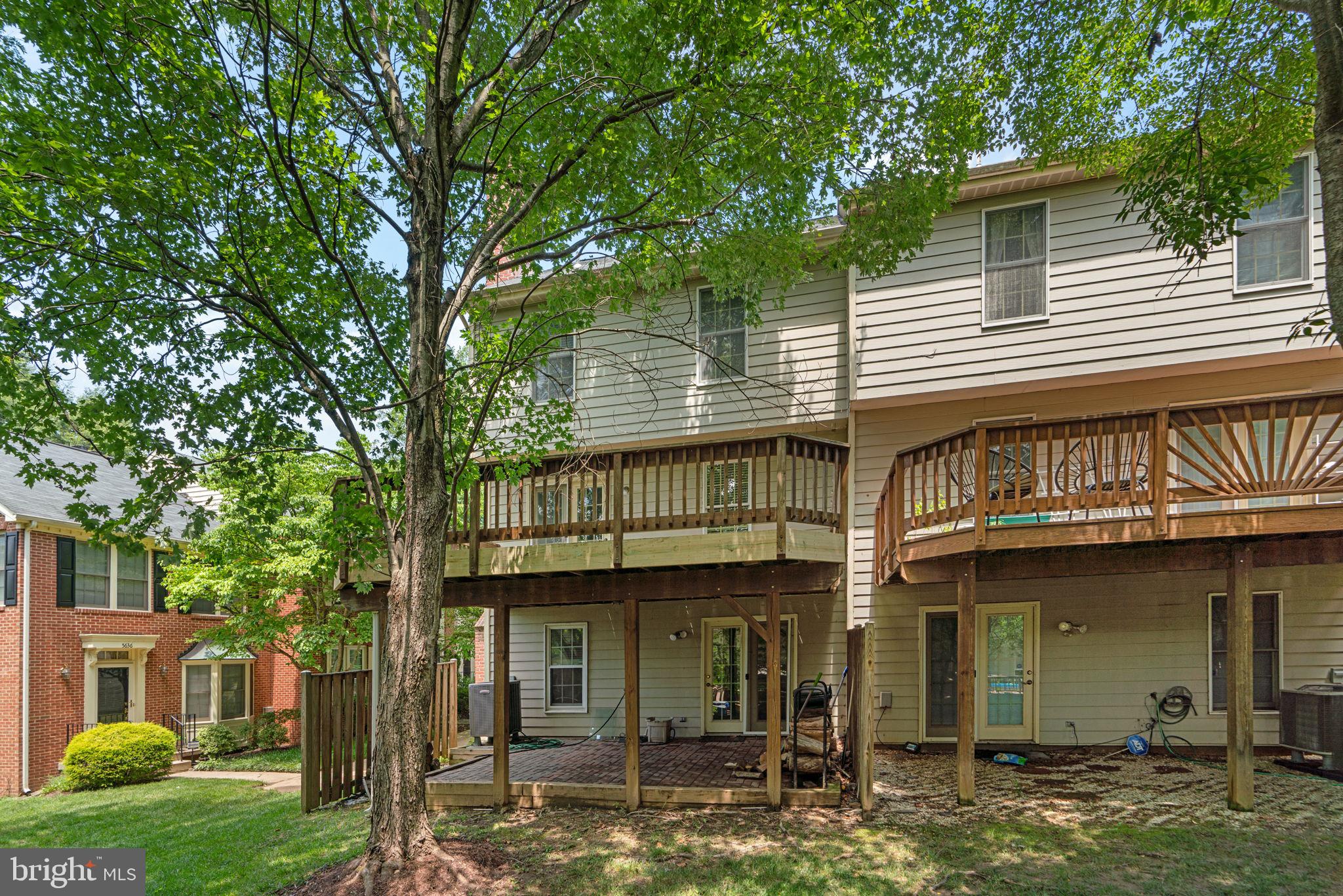 5646 April Journey, Unit 50 Columbia, MD 21044 - Photo 30 of 32 a view of a house with a balcony