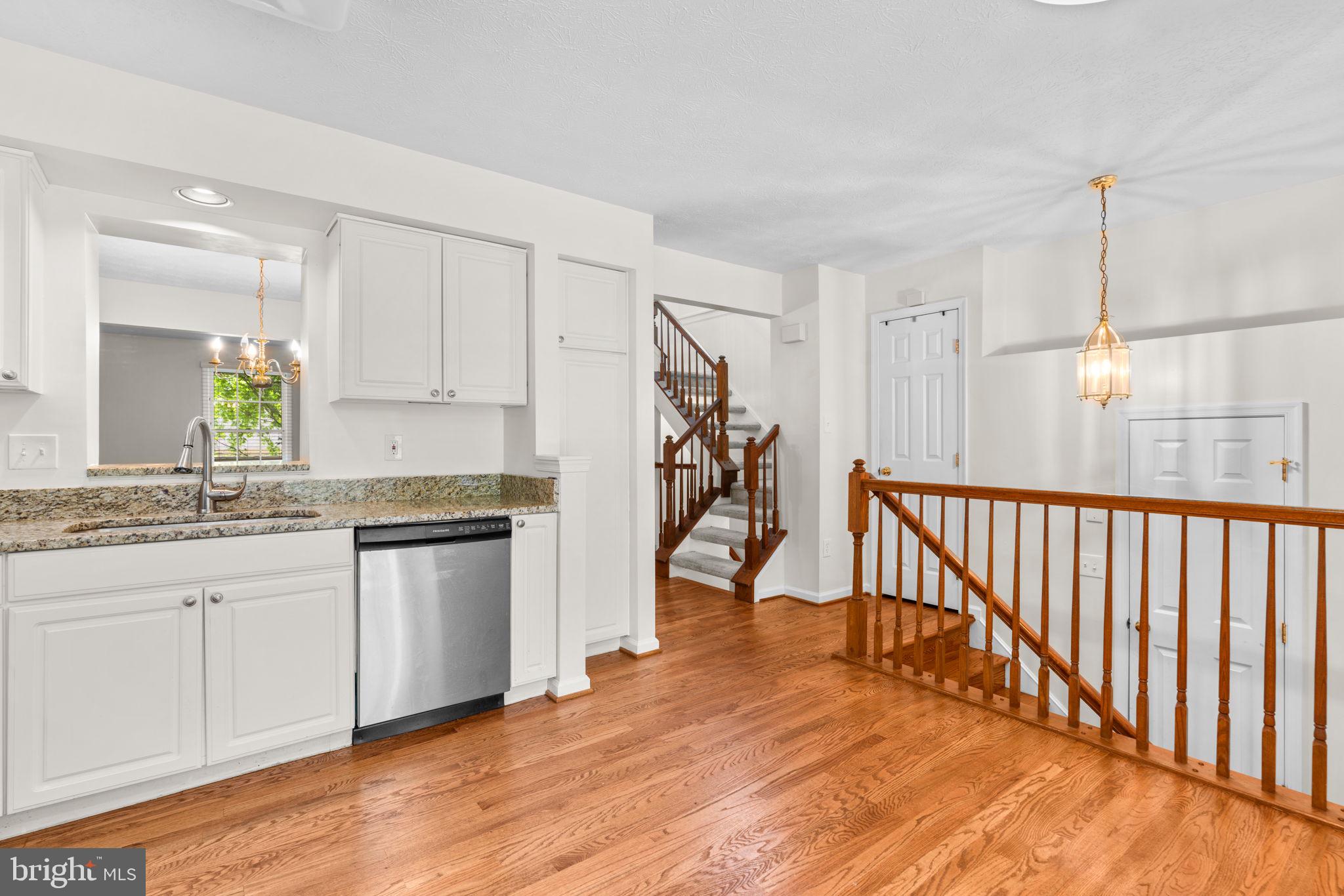 5646 April Journey, Unit 50 Columbia, MD 21044 - Photo 5 of 32 a kitchen with sink and cabinets