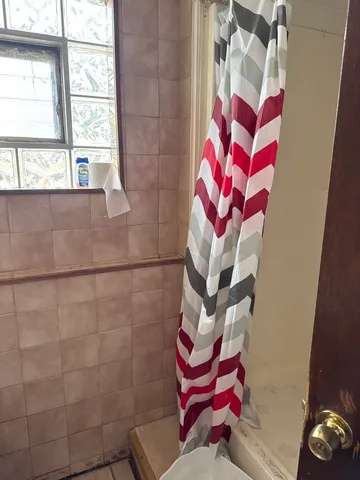 a bathroom with a sink and a bathtub