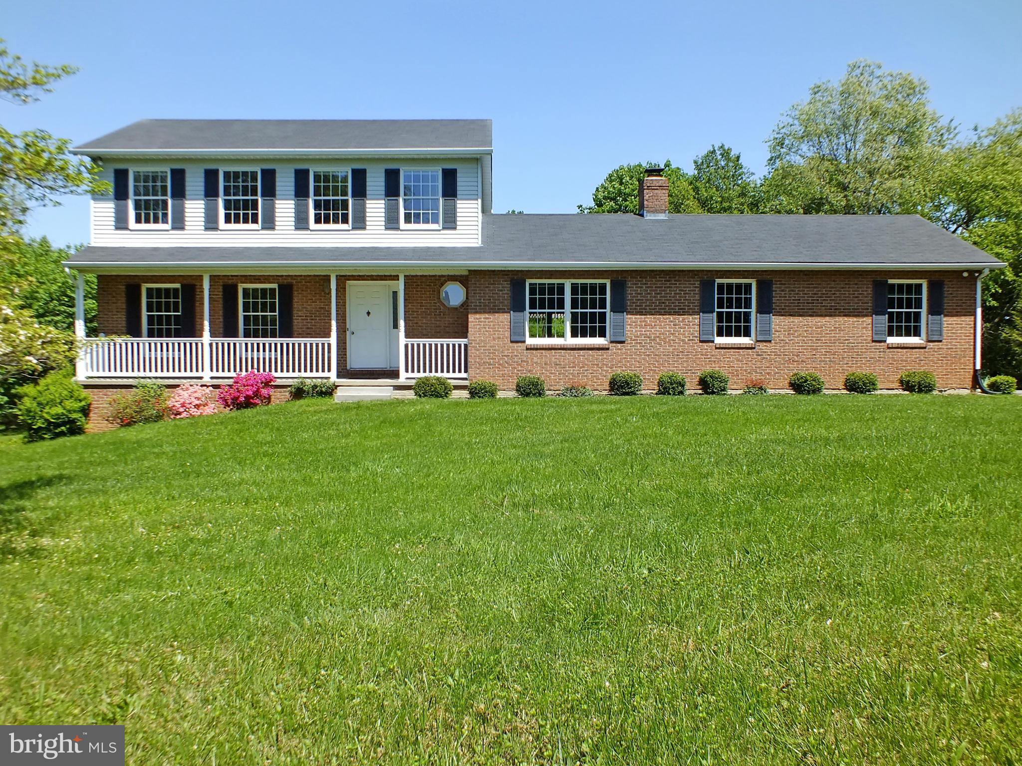 18249 Falls Road Hampstead, MD 21074 - Photo 1 of 30 a front view of house with yard