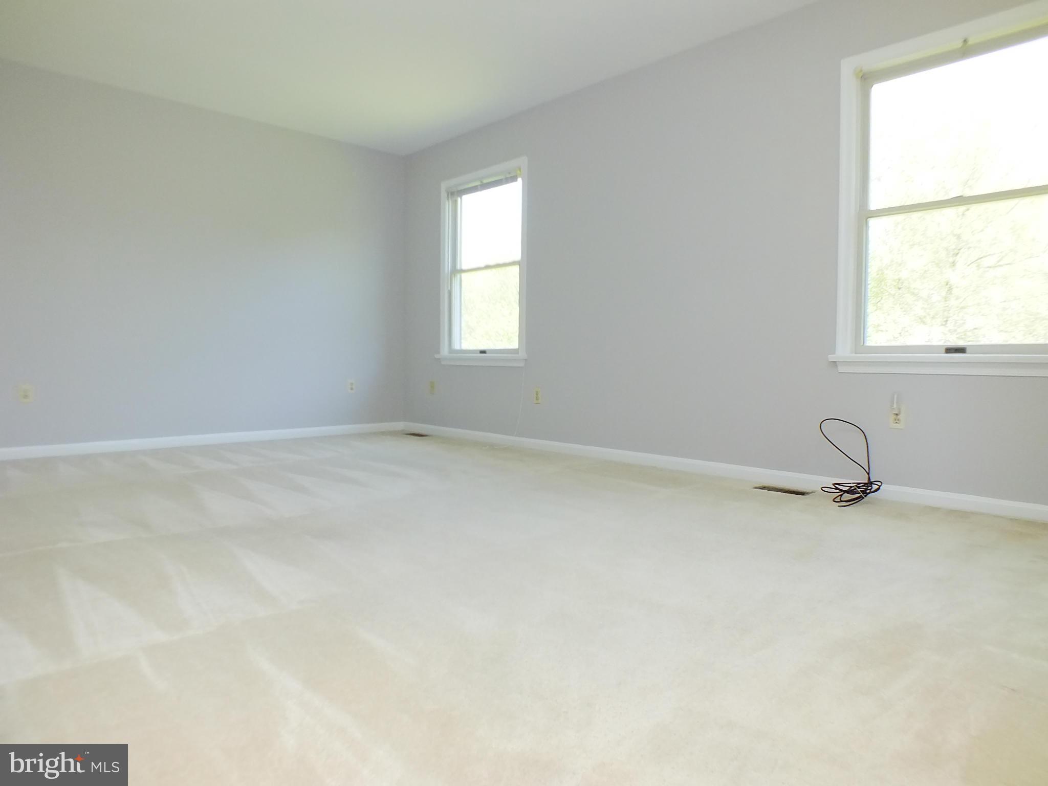 18249 Falls Road Hampstead, MD 21074 - Photo 14 of 30 an empty room with a window