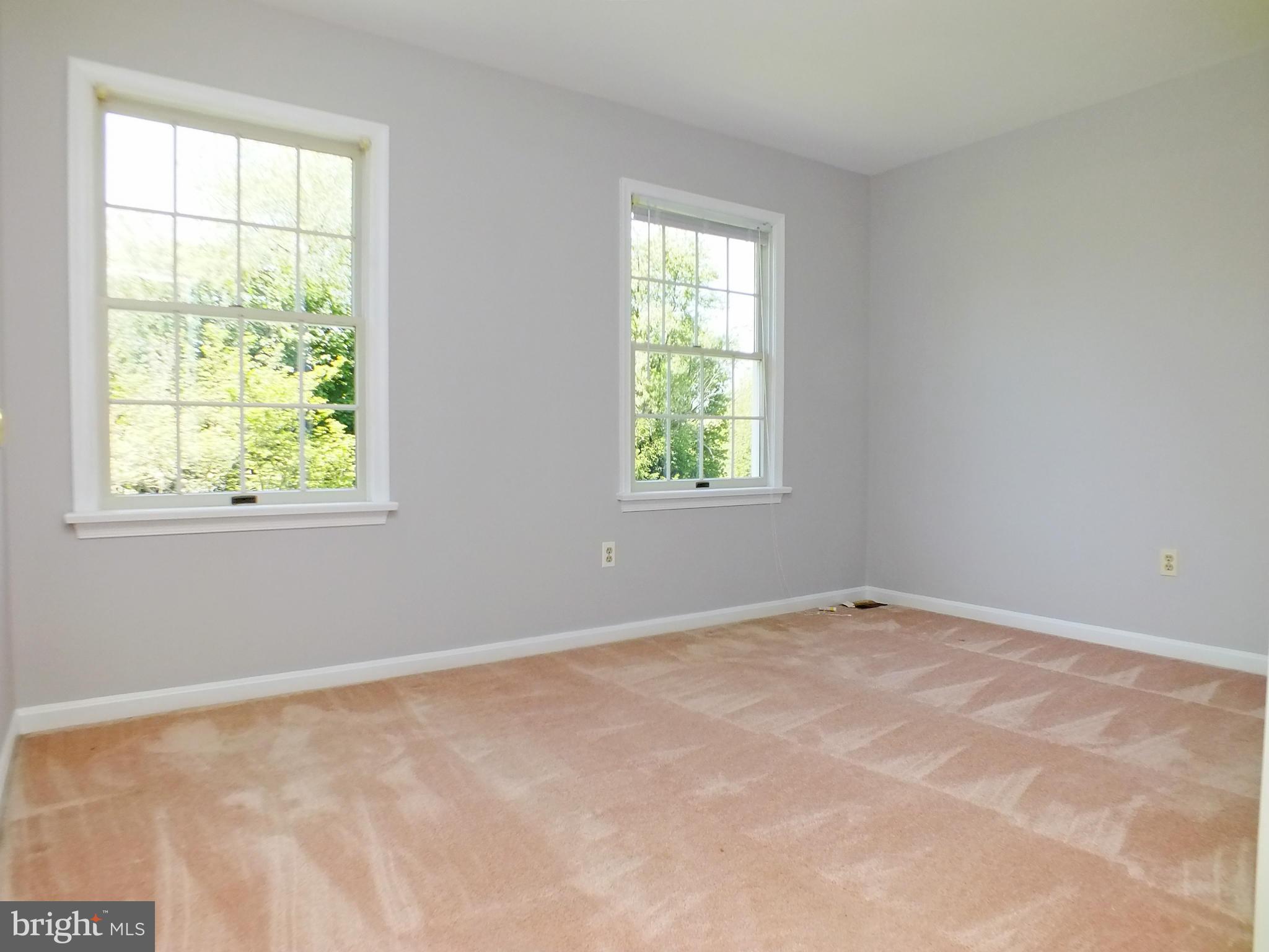 18249 Falls Road Hampstead, MD 21074 - Photo 20 of 30 an empty room with a window