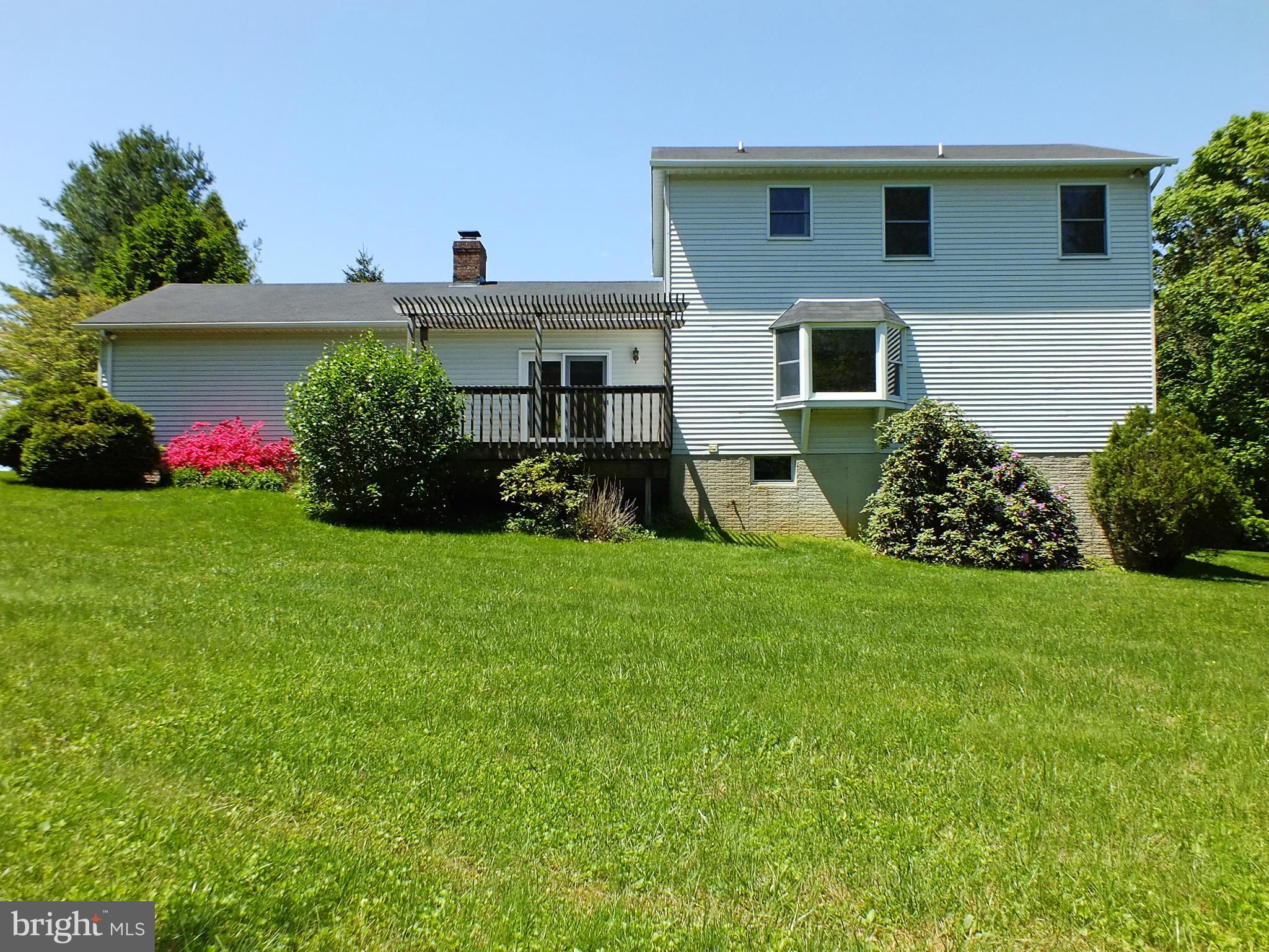 18249 Falls Road Hampstead, MD 21074 - Photo 27 of 30 a front view of house with garden