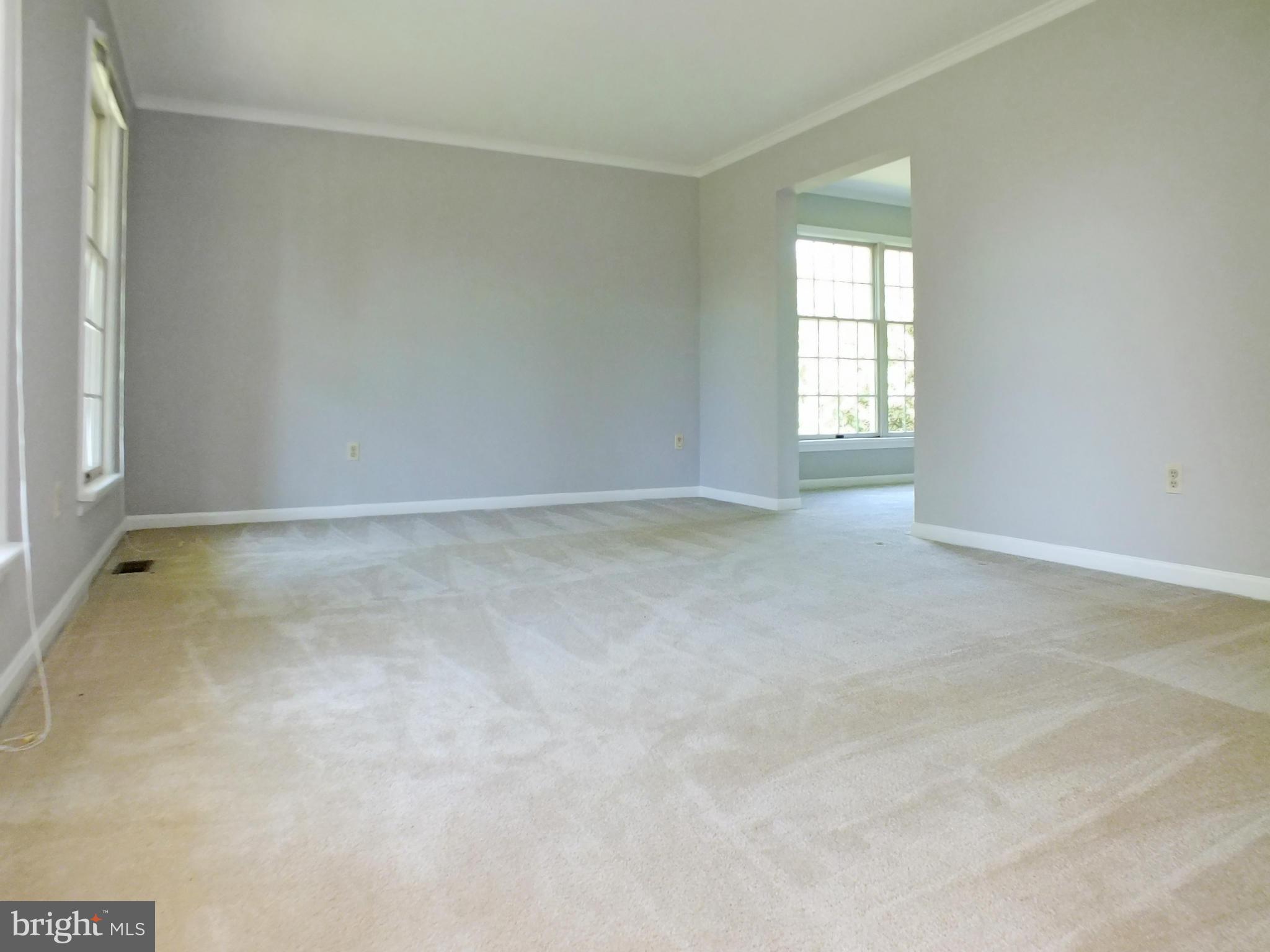 18249 Falls Road Hampstead, MD 21074 - Photo 4 of 30 an empty room with windows
