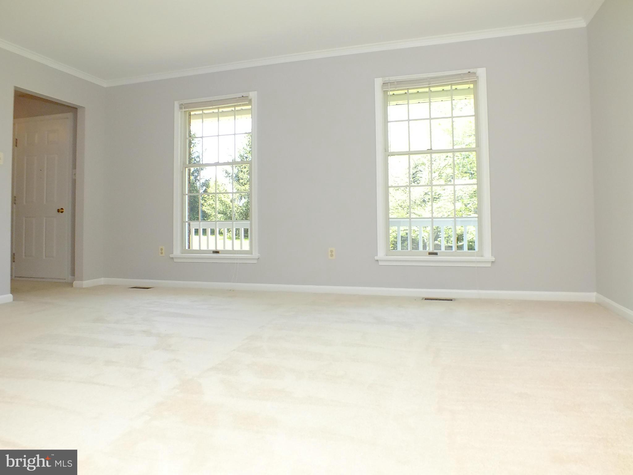 18249 Falls Road Hampstead, MD 21074 - Photo 5 of 30 an empty room with a window