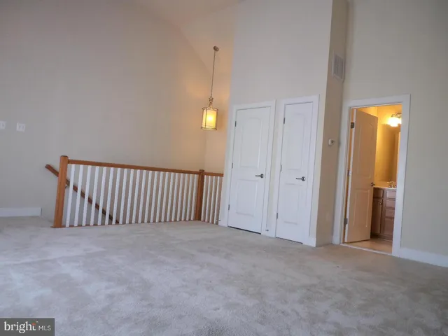 a view of a hallway with entryway