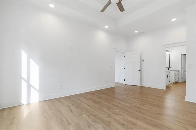 a bathroom with a double vanity sink and mirror with shower