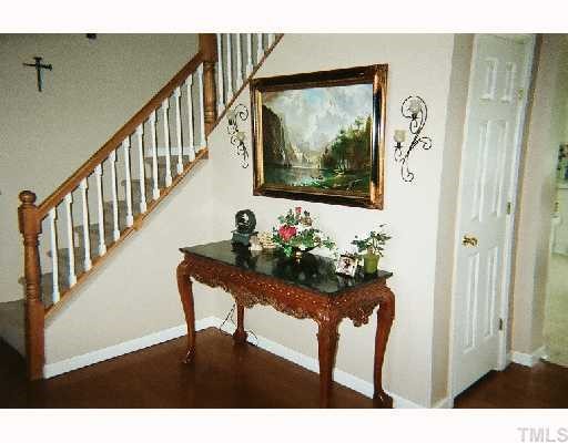 1178 Cash Road Creedmoor, NC 27522 - Photo 7 of 12 Entry way with soaring 2 story foyer, and beautiful hardwoods!