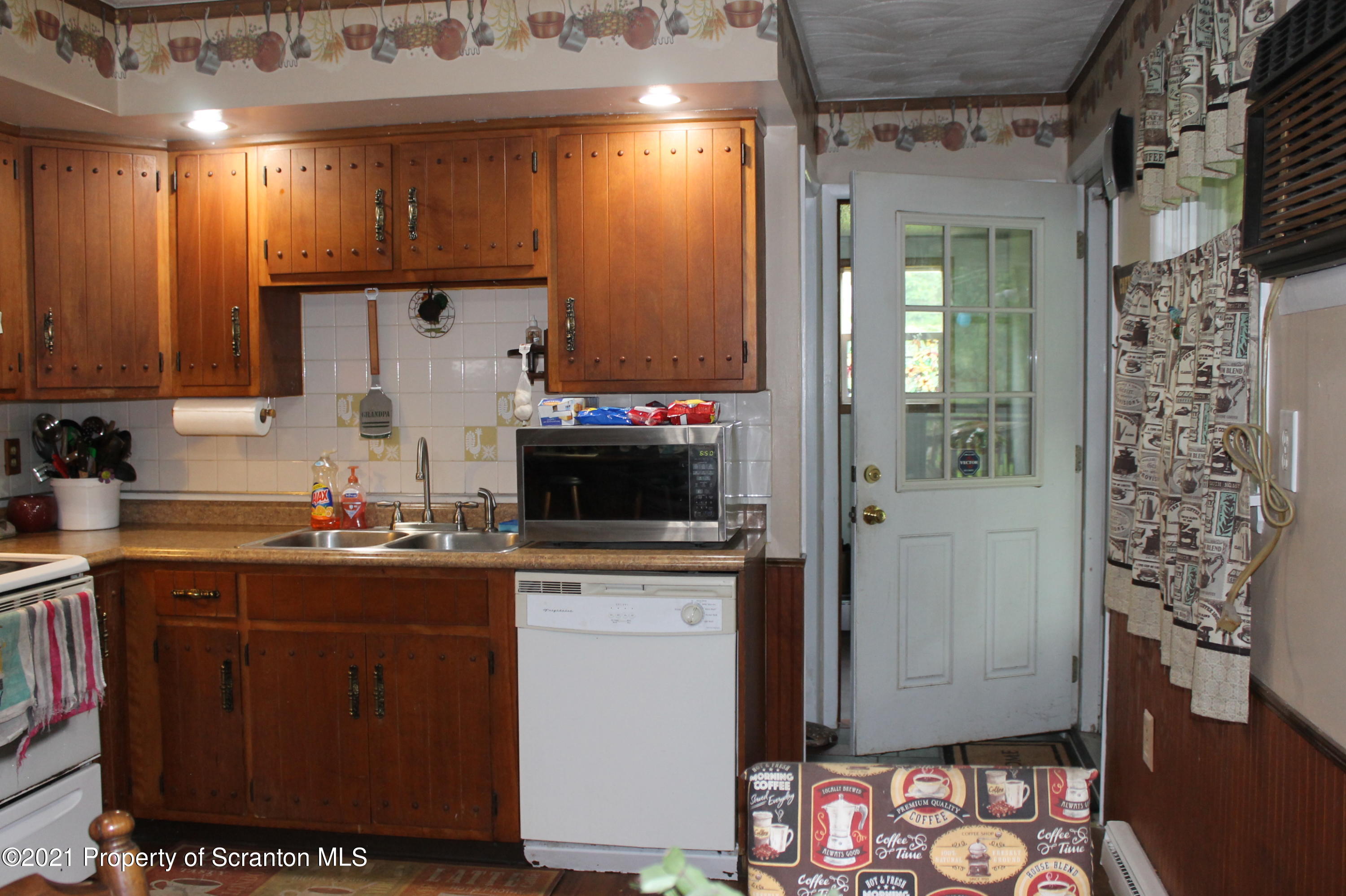 3431 Aberdeen Road Moscow, PA 18444 - Photo 4 of 28 a kitchen with a sink and cabinets
