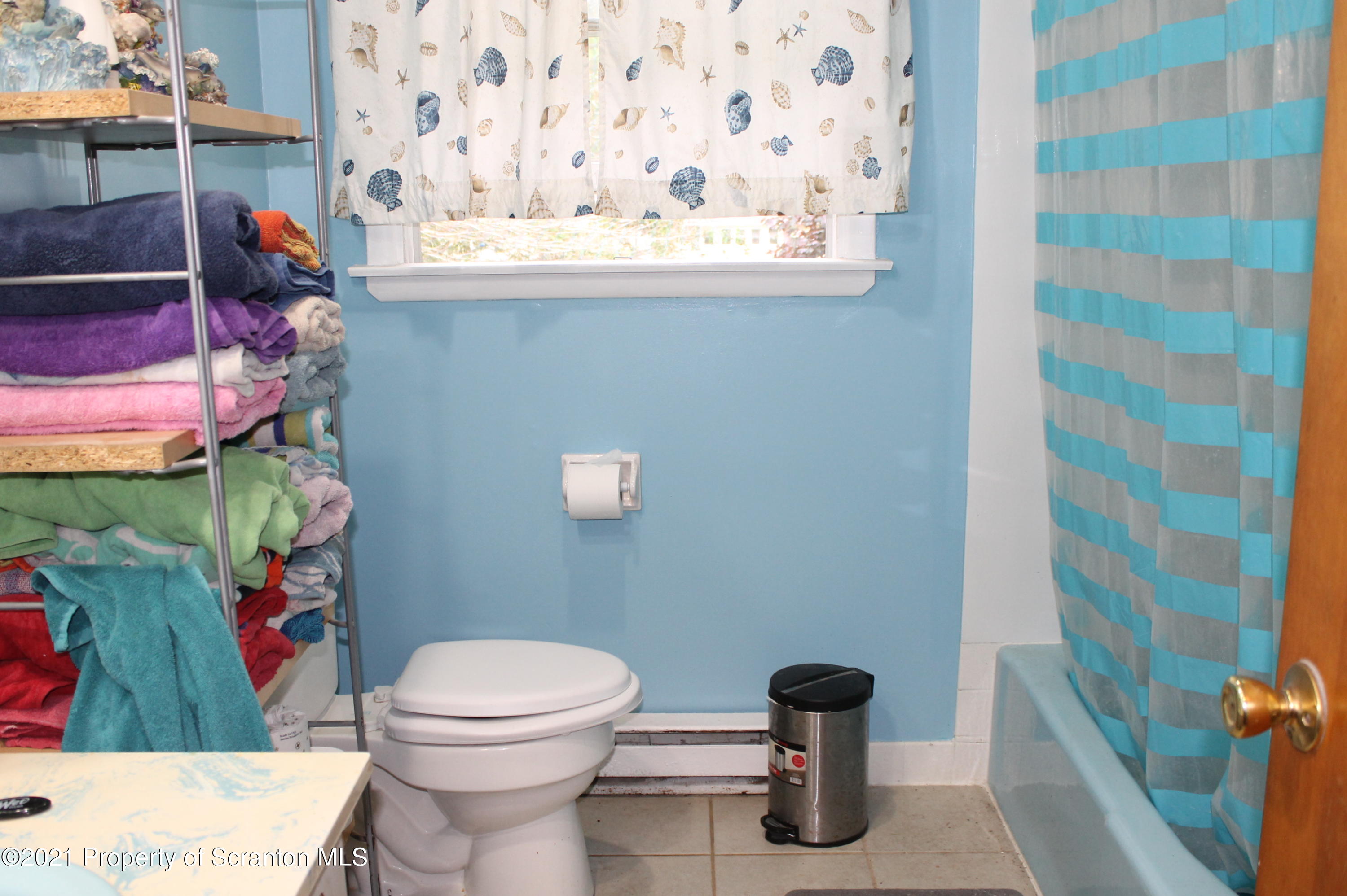 3431 Aberdeen Road Moscow, PA 18444 - Photo 8 of 28 a bathroom with a toilet and a sink