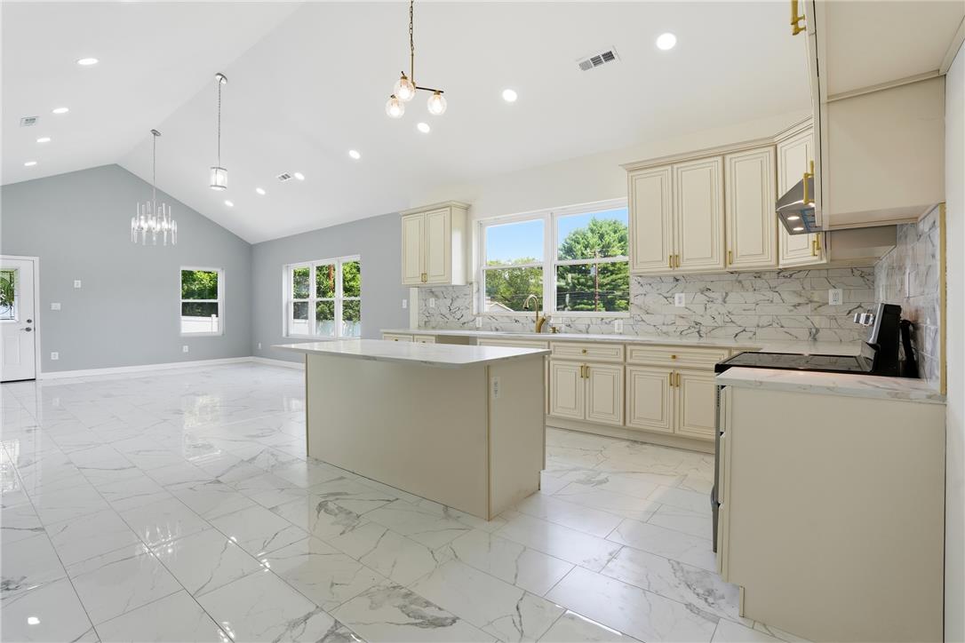 601 Fireline Road Bowmanstown, PA 18071 - Photo 5 of 21 a kitchen with a sink window and cabinets