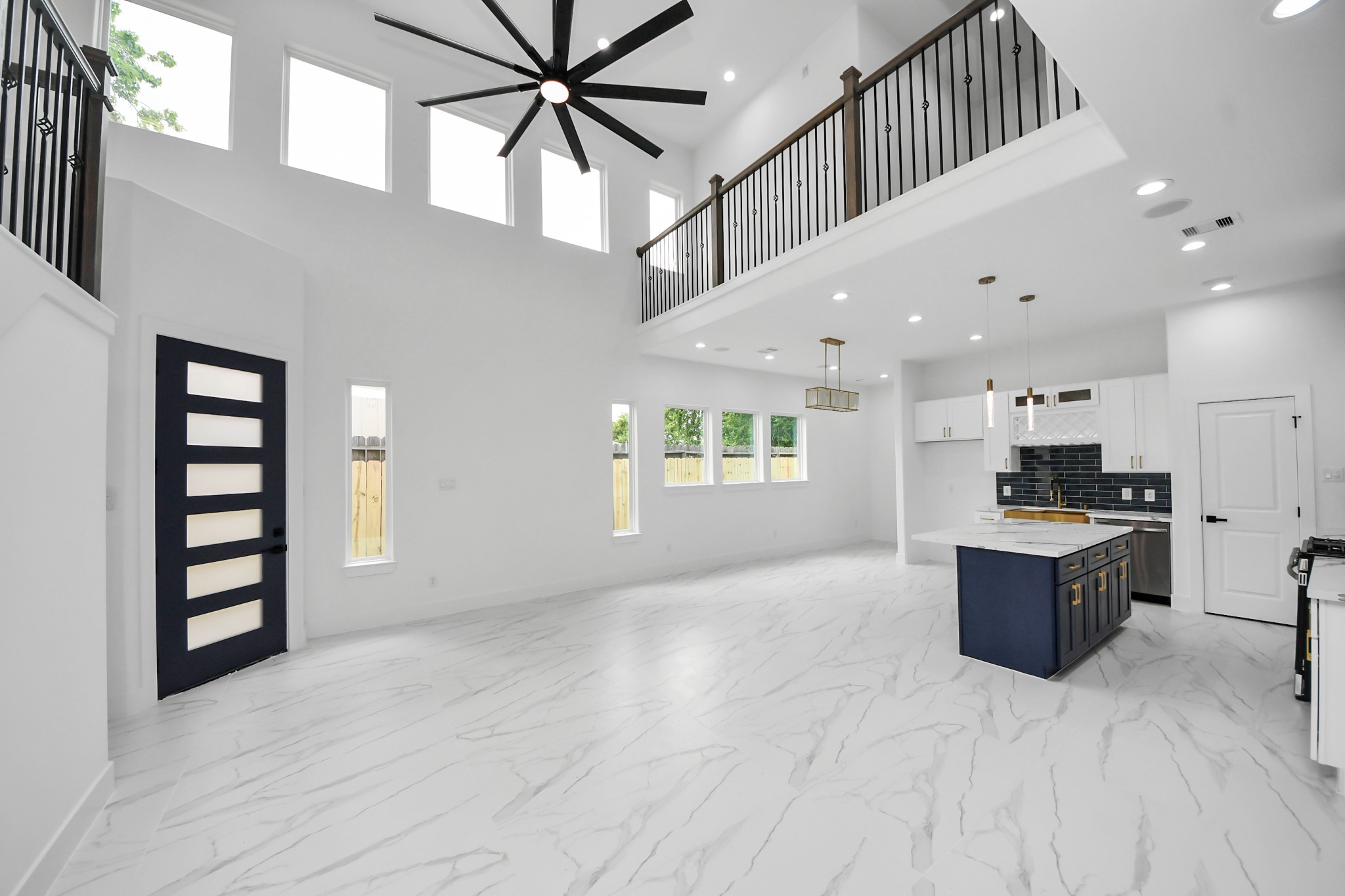 6629 Foster Street Houston, TX 77021 - Photo 2 of 33 Open concept living area filled with natural light and expansive sightlines.